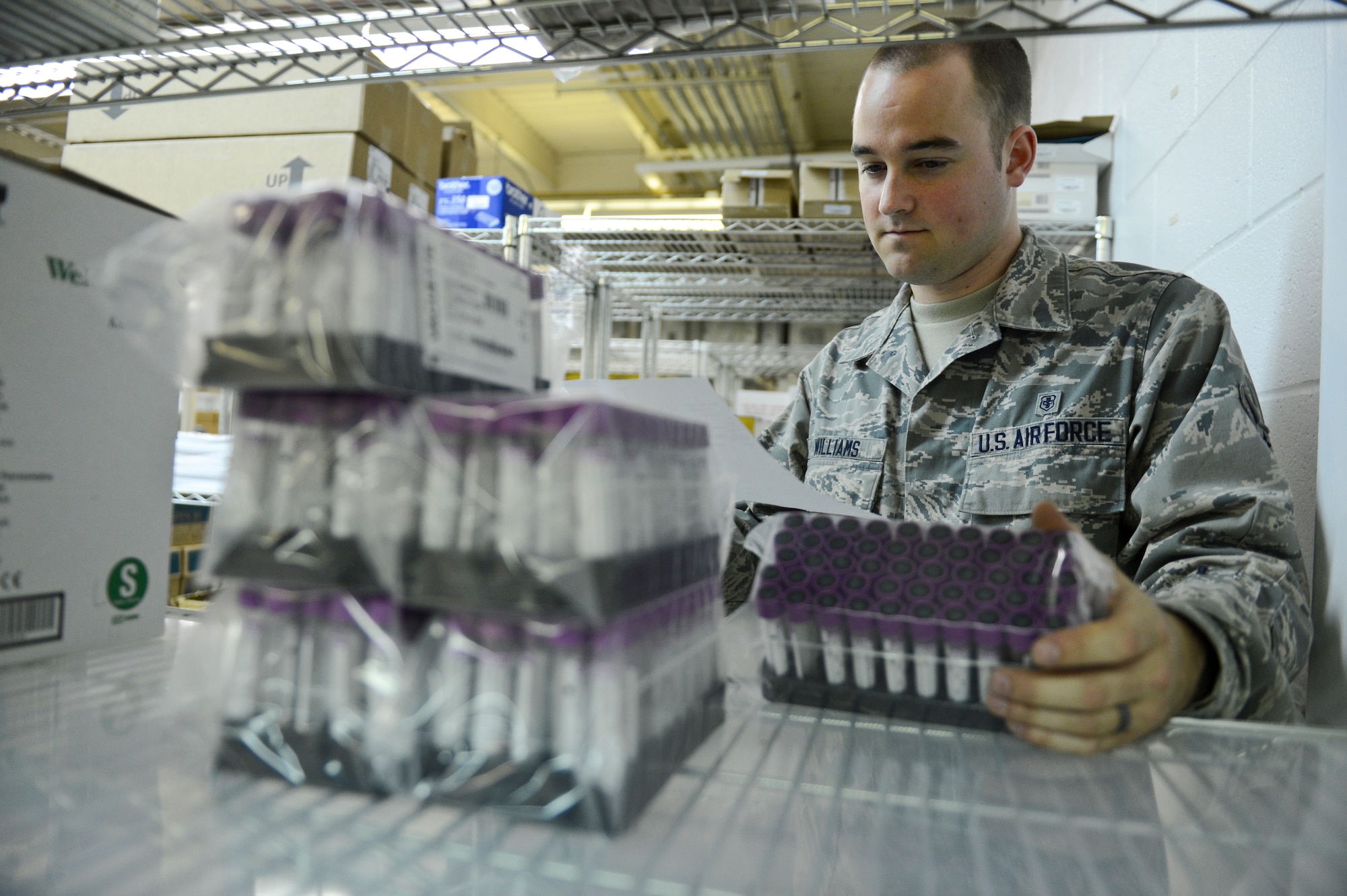Airman 1st Class Jordan Williams, 2nd Medical Support Squadron Medical Logistics, takes inventory of vacuum tubes on Barksdale Air Force Base, La., May 21, 2013. Inventory is conducted to keep track of incoming and outgoing supplies. (U.S. Air Force photo/Senior Airman Micaiah Anthony)