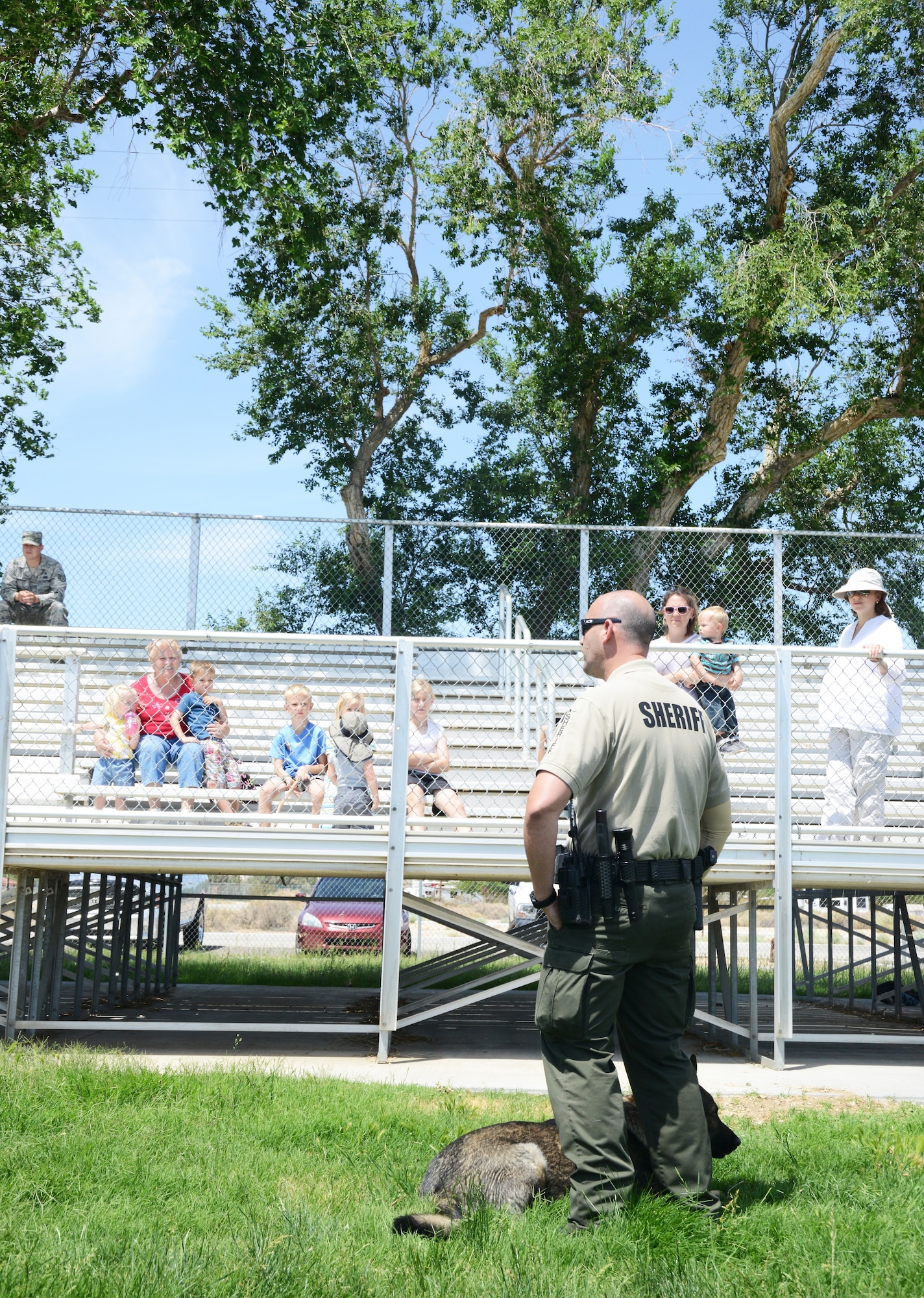 Kern County Sheriff's Department K-9 deputies joined members of the 412th Security Forces Squadron for a K-9 demonstration May 15 at Arnold Park. (U.S. Air Force photo by Kenji Thuloweit)