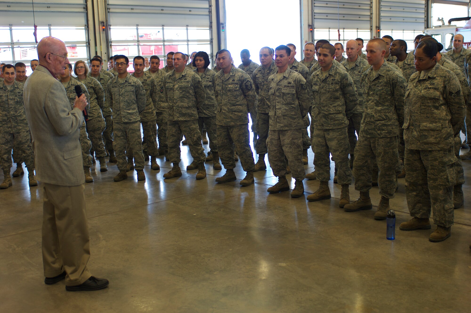 Retired Chief Master Sgt. of the Air Force James McCoy speaks to Airmen of the 7th Civil Engineer Squadron May 10, 2013, at Dyess Air Force Base, Texas. McCoy visited the men and women of Dyess to speak with them about his Air Force career, share his thoughts about today's military and answer questions. He also was the guest speaker for the 317th Airlift Group's Enlisted Dining-Out. (U.S. Air Force Photo by Airman 1st Class Kylsee Wisseman/Released)