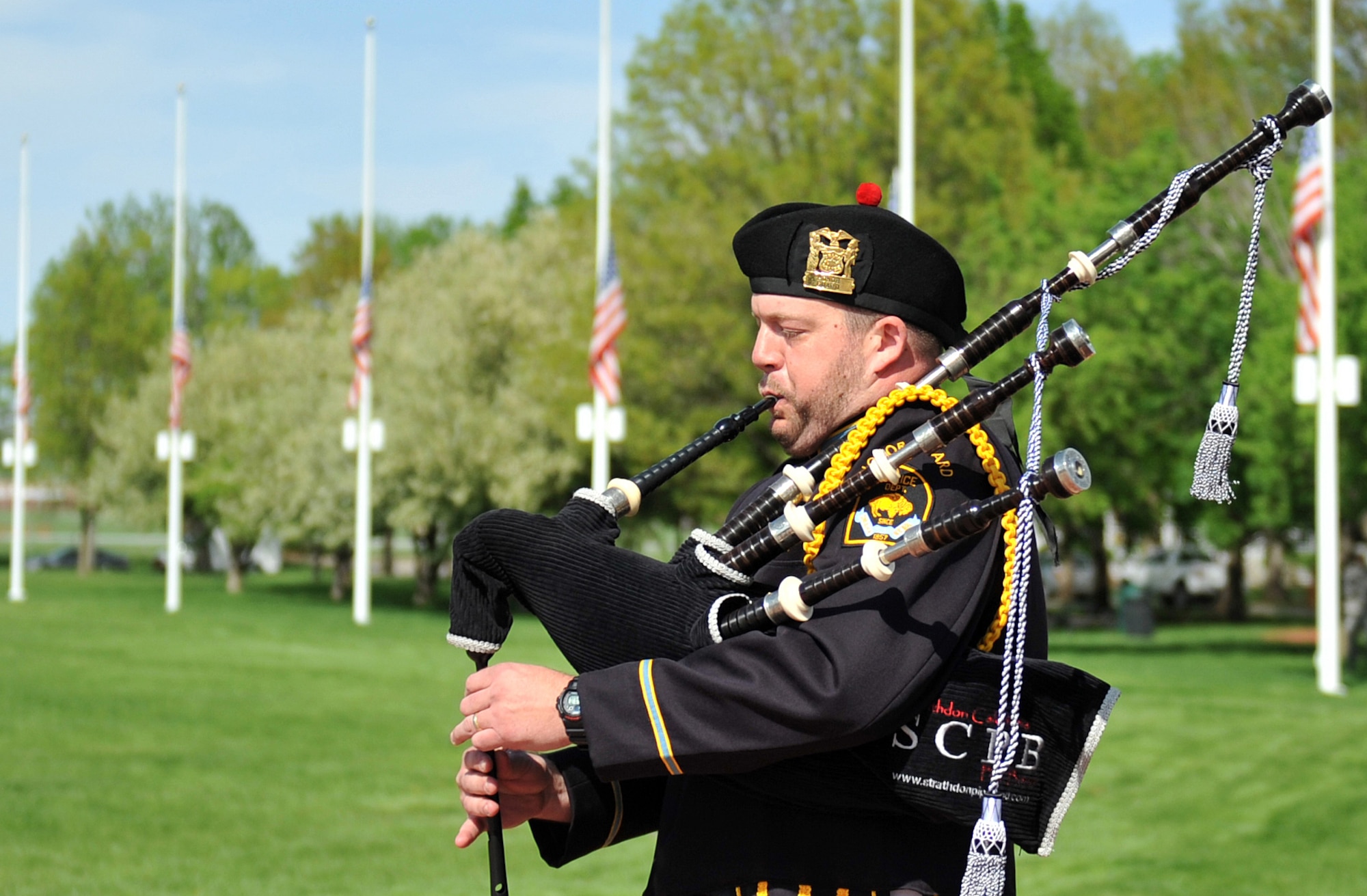 Sgt. Jeremy Christensen, Omaha Police Department, plays the bagpipes in honor of fallen police officers during the Police Week Retreat Ceremony held on May 16 at Offutt Air Force Base, Neb. (U.S. Air Force photo by Jeff W. Gates/Released)