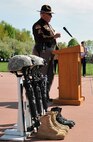 Lt. Russell L. Zeeb, Sarpy County Sheriff’s Department, speaks about his experiences on the police force during a retreat ceremony held at the Offutt Parade Grounds during National Police week at Offutt Air Force Base, May 16. (U.S. Air Force photo by Jeff W. Gates/Released)