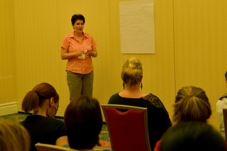 U.S. Air Force Capt. Katherine Scott, 20th Fighter Wing chaplain speaks to airmen and spouses, Charleston, S.C., May 18, 2013. The retreat was held to strengthen the bond of the couples and help enhance their marriage. (U.S. Air Force photo by Airman 1st Class Ashley L. Gardner/Released)