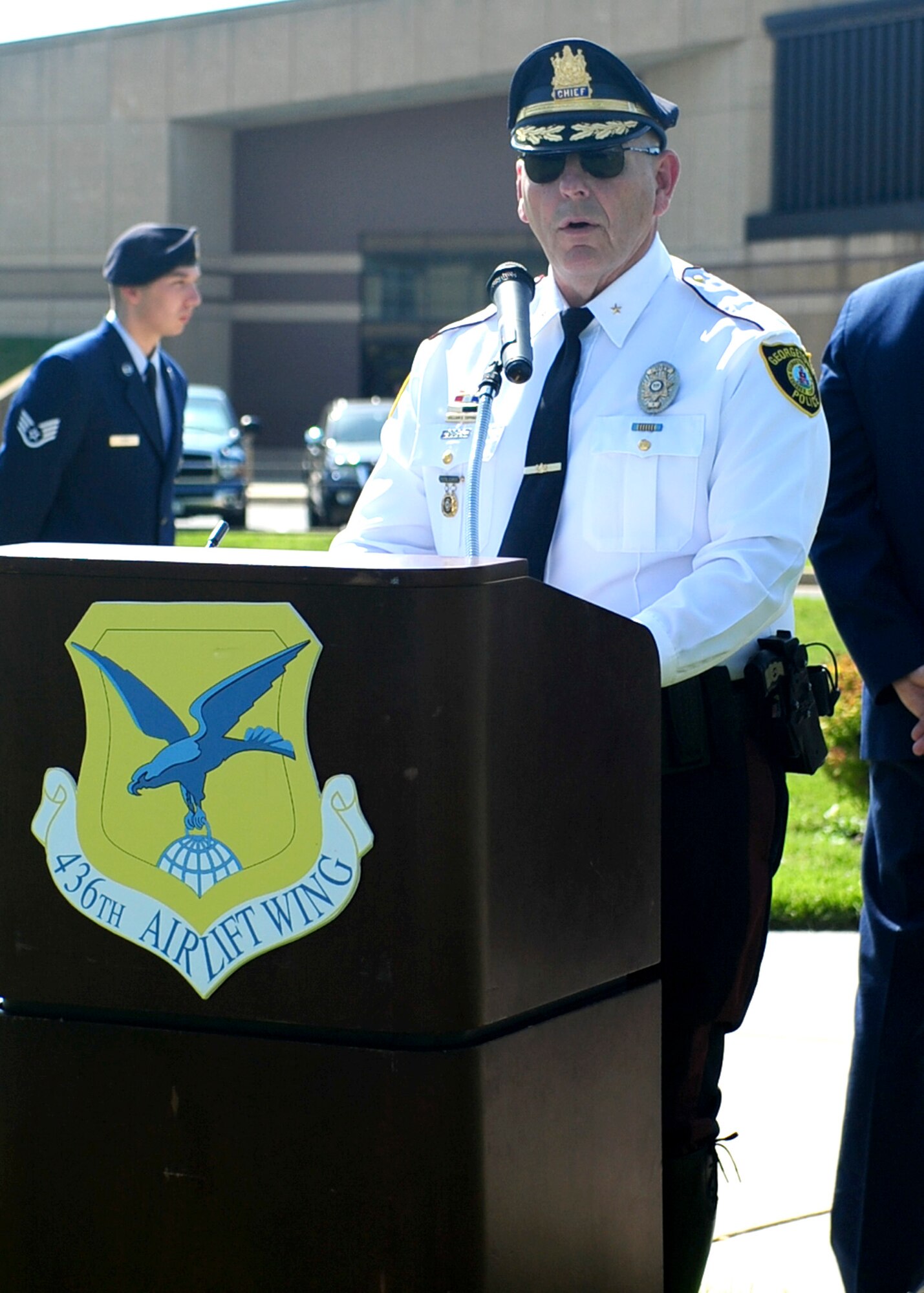 William Topping, Georgetown, Del. police chief, addresses the audience during a retreat ceremony May 17, 2013, at the 436th Airlift Wing headquarters building on Dover Air Force Base, Del. Topping was the guest speaker at the ceremony which celebrated National Police Week and honored fallen officers in the state of Delaware and their families. (U.S. Air Force photo/Airman 1st Class Ashlin Federick)
