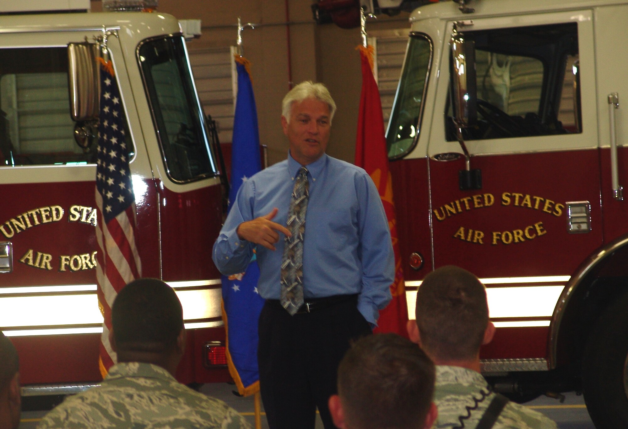 Air Force Fire Chief Jim Podolske  talks to Eglin firefighters about physical fitness, furloughs, and other personnel issues when he visited Fire Station 1 May 22.  Podolske manages a force of more than 9,200 military and civilian firefighters as well as the programs that provide them with equipment, vehicles and training. (US Air Force photo/Lois Walsh)