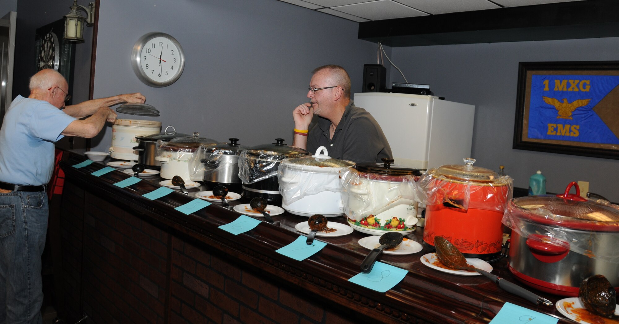 The 192nd FW Advance Programs Office hosted the second annual Chili Cook-off, May 18, 2013, where 12 varieties of chili were served. Rachel Vis, team captain for the event, led the cook-off for the American Cancer Society, in honor of the late Master Sgt. Wesley "Chili" Childress, former VaANG member, who passed away from cancer in 2011. (U.S. Air National Guard photo by Master Sgt. Carlos J. Claudio/Released)