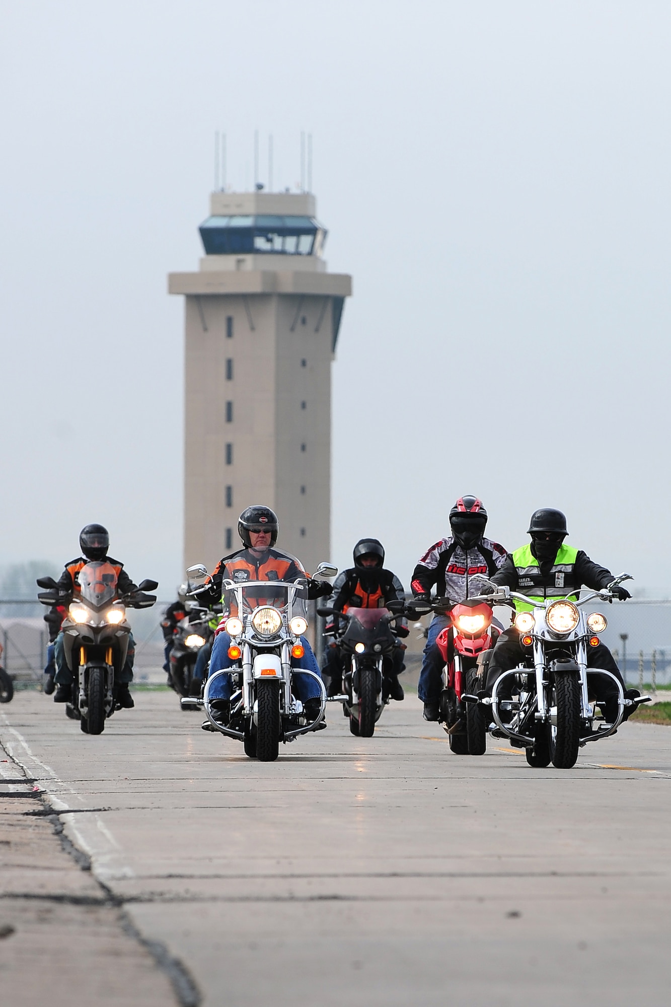 Motorcycle riders depart Offutt Air Force Base, Neb. for the 2013 55th Wing Mentorship Ride May 10. More than 100 riders participated in the event that provided hands-on experience riding in groups over a span of 134 miles. Group riding is known to be an effective way to influence new riders on using safe practices.  (U.S. Air Force photo by Josh Plueger/Released)