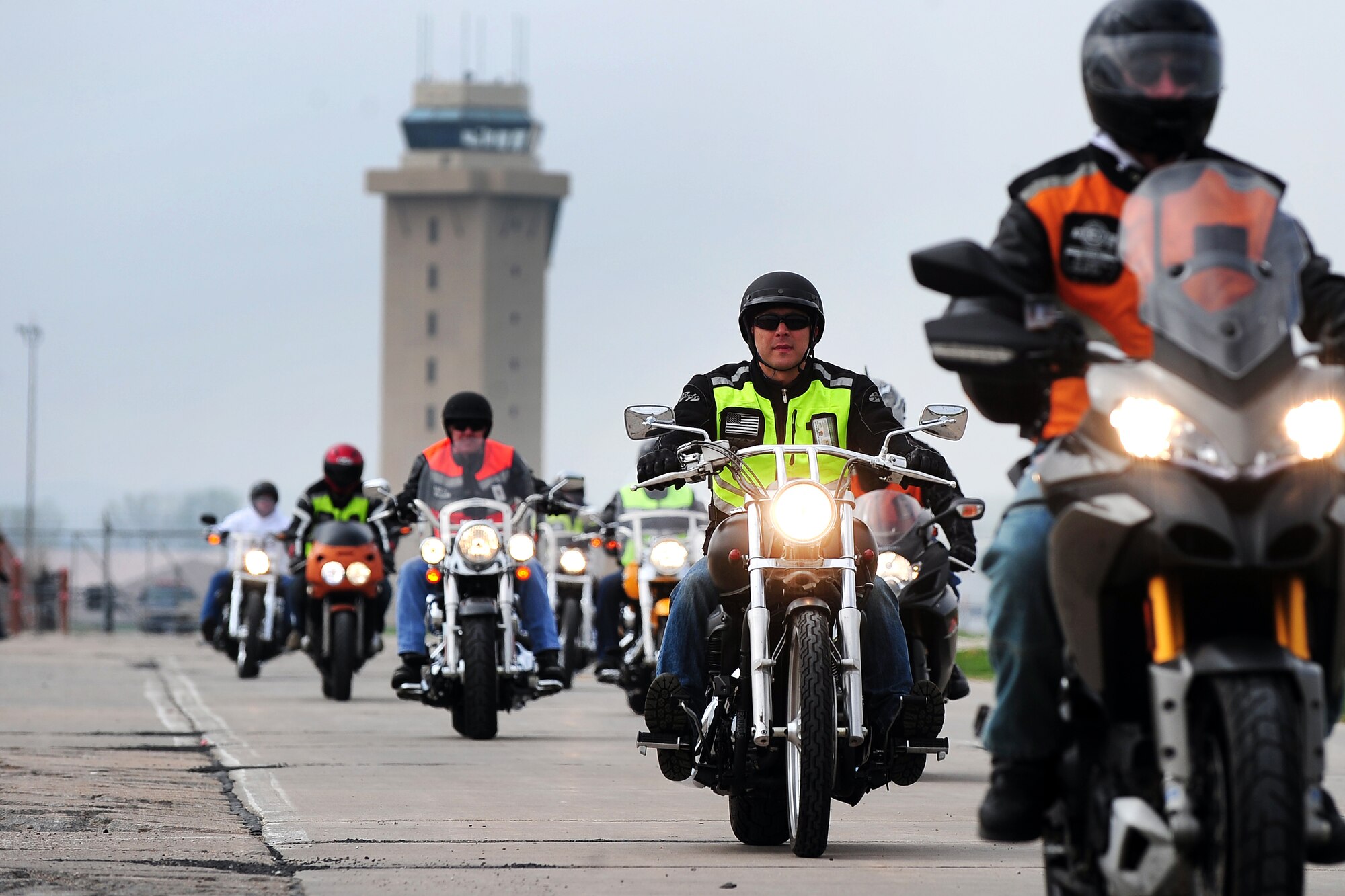 Motorcycle riders depart Offutt Air Force Base, Neb. for the 2013 55th Wing Mentorship Ride May 10. More than 100 riders participated in the event that provided hands-on experience riding in groups over a span of 134 miles. Group riding is known to be an effective way to influence new riders on using safe practices.  (U.S. Air Force photo by Josh Plueger/Released)