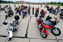 Motorcycles sit on the Mike North ramp of Offutt Air Force Base, Neb. May 10 for the 2013 55th Wing Mentorship Ride. More than 100 riders participated in the event that provided hands-on experience riding in groups over a span of 134 miles. Group riding is known to be an effective way to influence new riders on using safe practices.  (U.S. Air Force photo by Josh Plueger/Released)