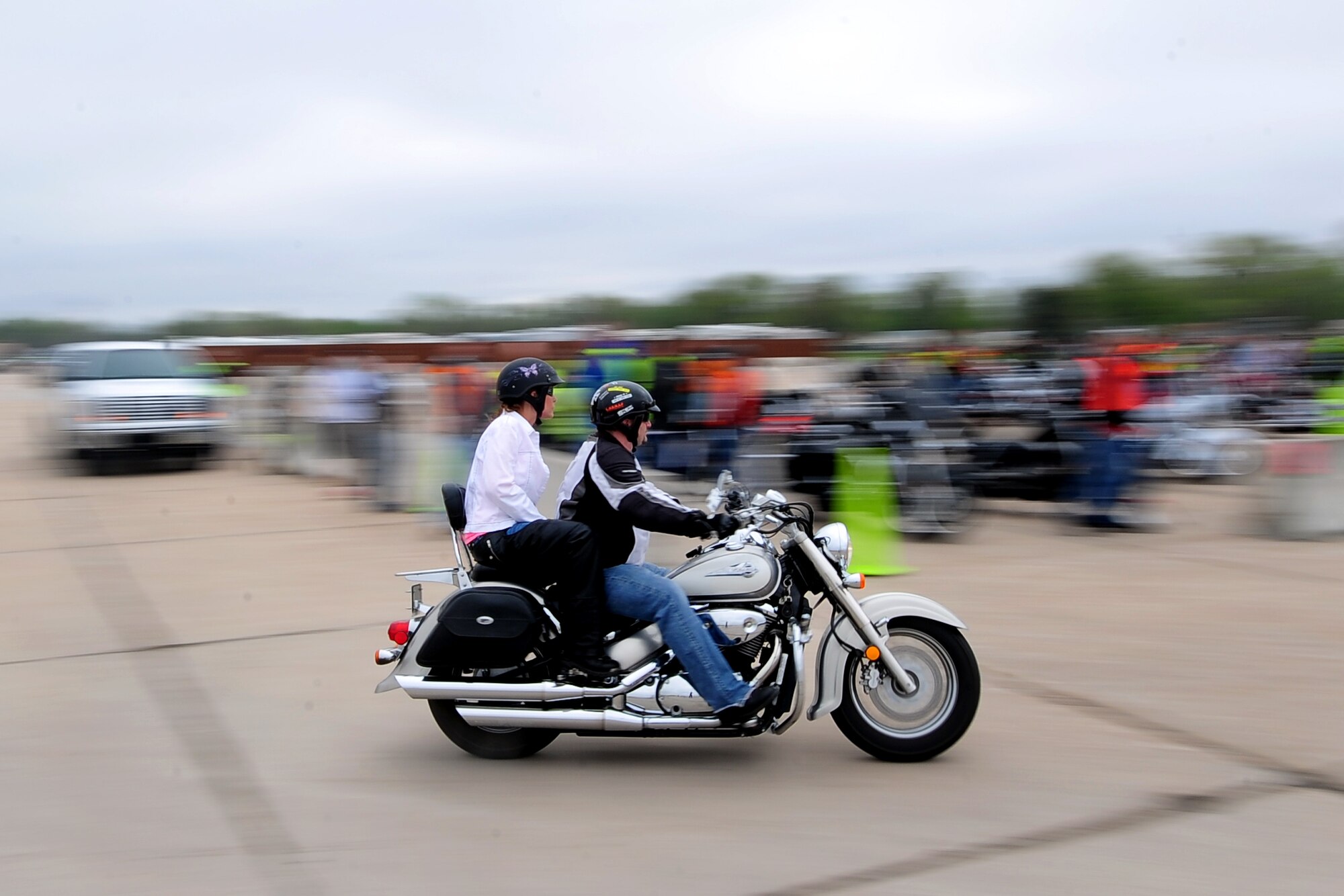 U.S. Air Force Master Sgt. (Retired) Timothy Smith departs on his motorcycle from Offutt Air Force Base, Neb. to participate in the 55th Wing Mentorship Ride May 10. More than 100 riders participated in the event that provided hands-on experience riding in groups over a span of 134 miles. Group riding is known to be an effective way to influence new riders on using safe practices.  (U.S. Air Force photo by Josh Plueger/Released)