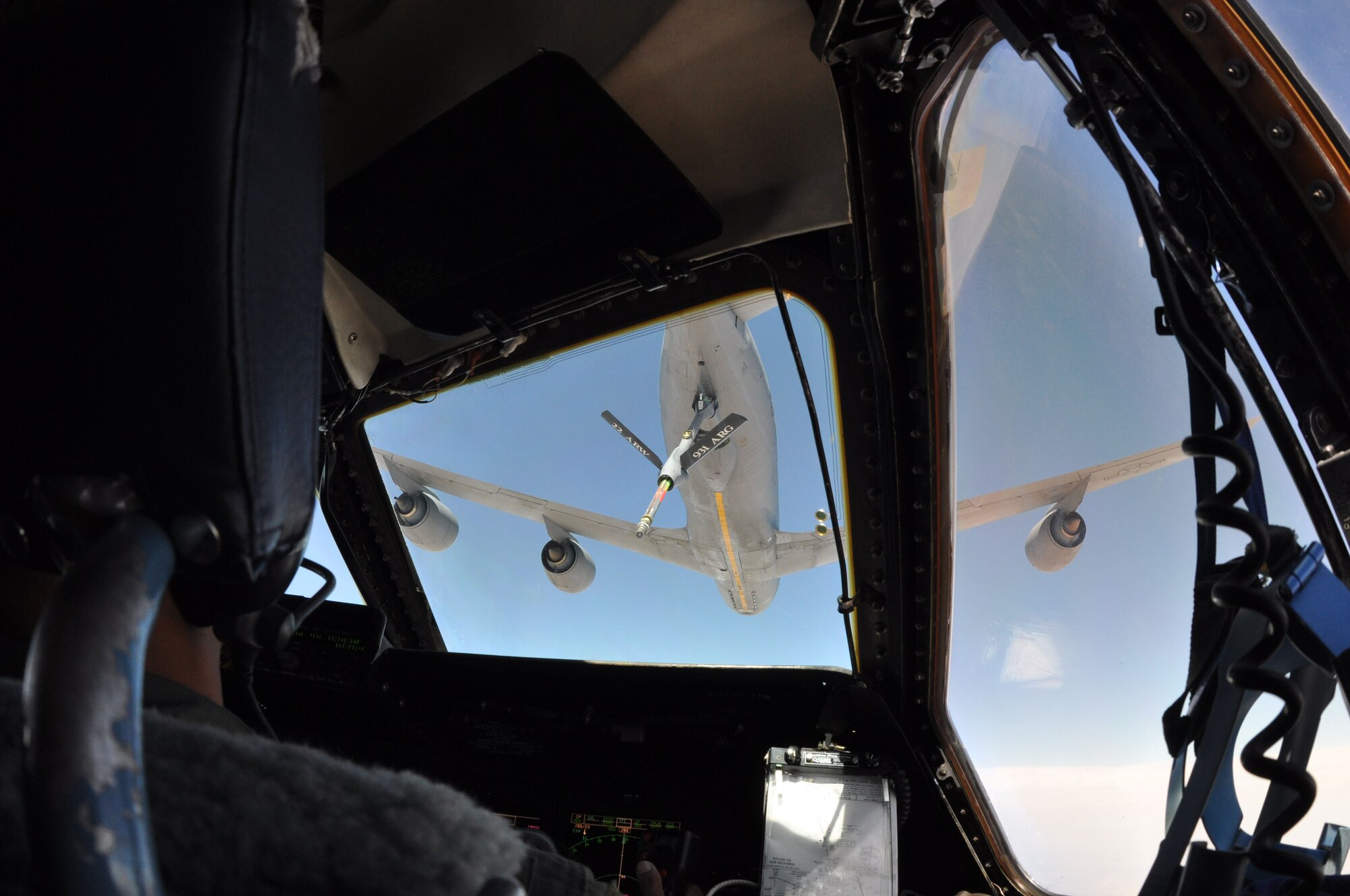 Maj. Makia Epie, an instructor pilot from the 433rd Airlift Wing pilots a C5A Galaxy toward the boom of a KC-135 Stratotanker during aerial refueling training, May 15. The 18th Air Refueling Squadron and the 931st Aircraft Maintenance Squadron sent aircrew and maintainers to Joint Base San Antonio-Lackland to provide aerial refueling to students of the Formal Training Unit. During the week-long business effort the aircrew from the 931st Air Refueling Group provided aeromedical evacuation training support and air refueling support to the 433rd Airlift Wing's various units. (Air Force photo by Master Sgt. Brannen Parrish)