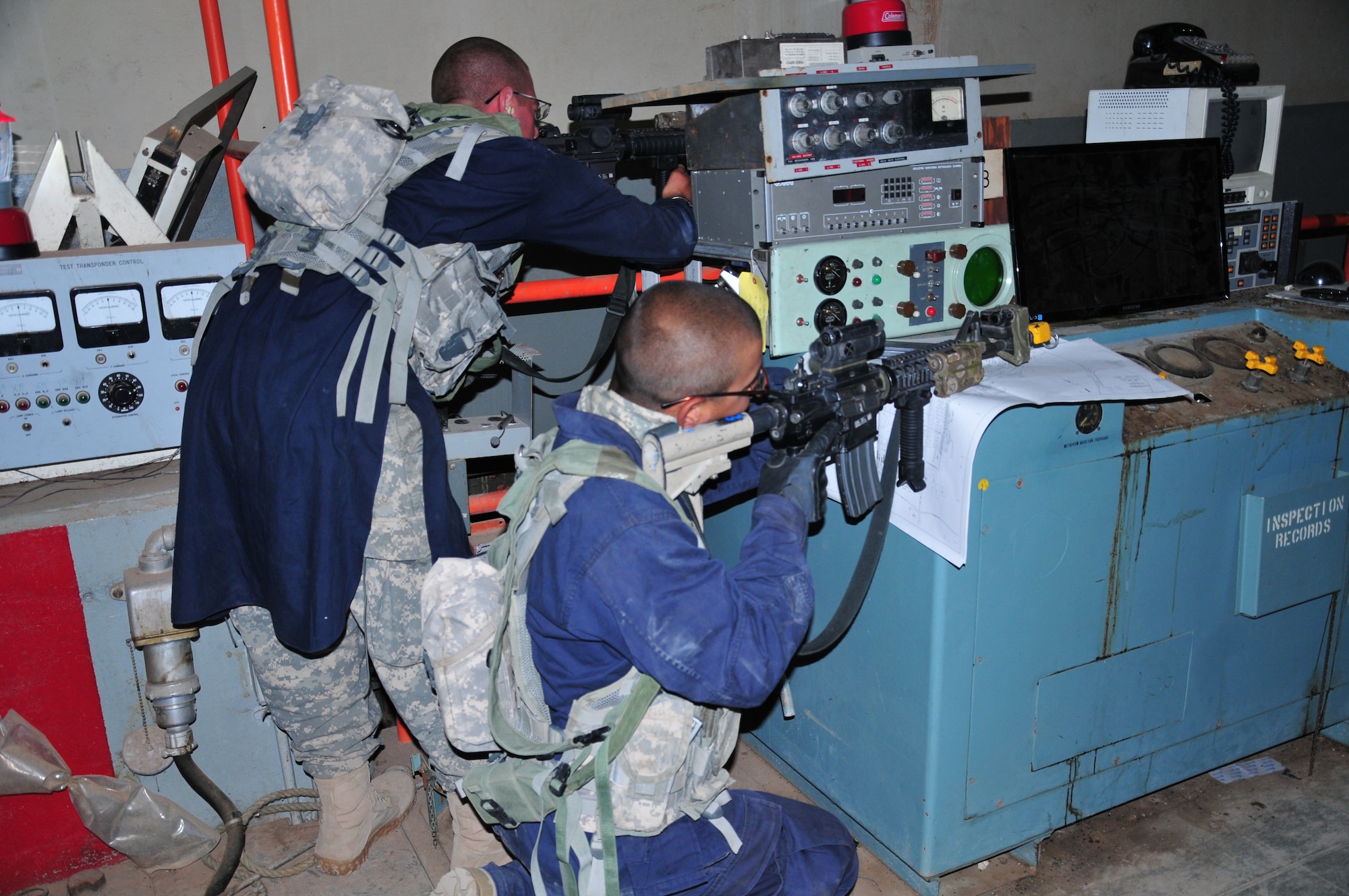 Soldiers from 1st Battalion, 77th Armored Regiment, 4th Brigade Combat Team, 1st Armored Division, role-play opposing forces during a mock raid inside a tunnel at the Network Integration Evaluation13.2, at White Sands Missile Range, N.M. (U.S. Army photo by Lt. Col. Deanna Bague/Released).

