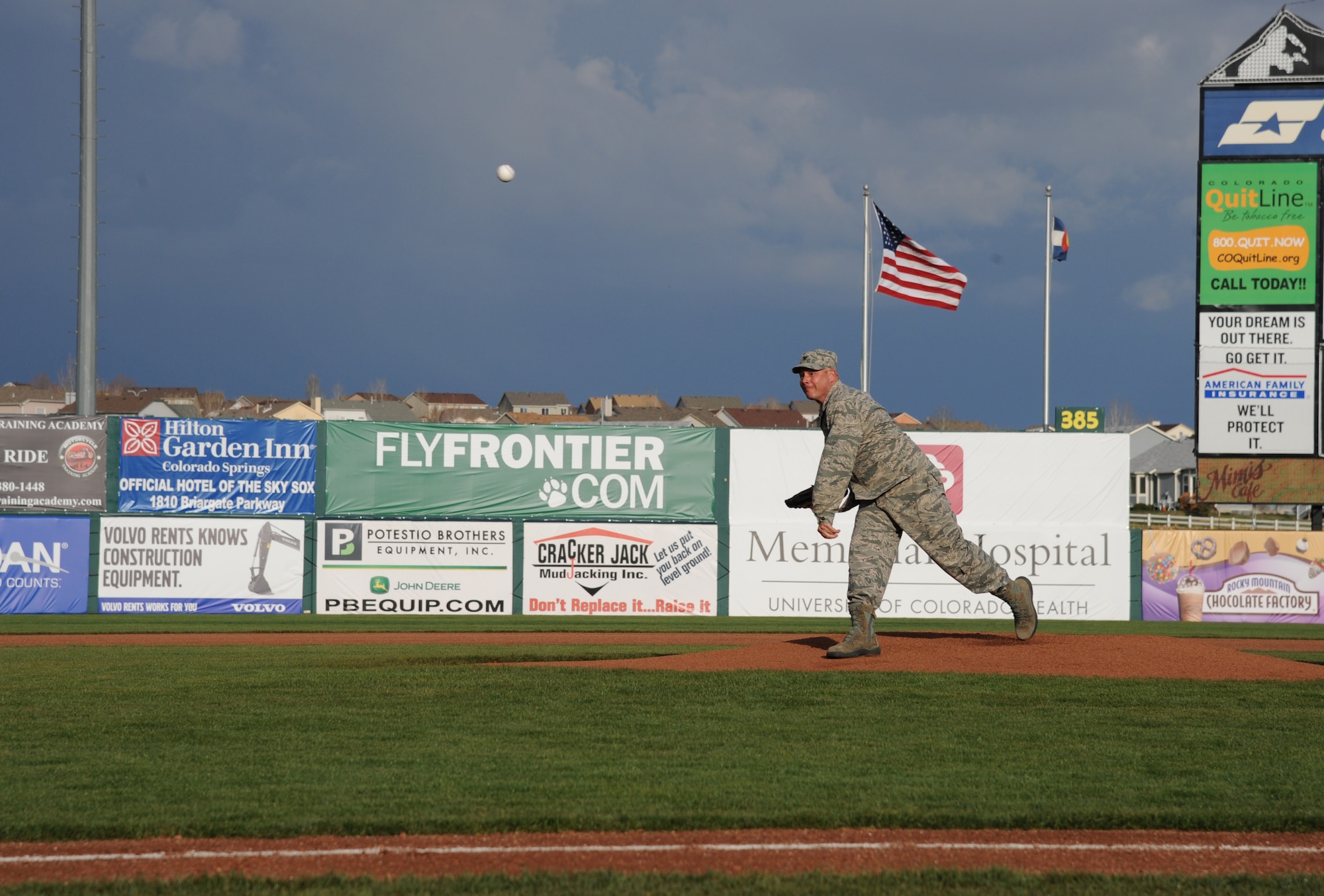 COLORADO SPRINGS, Colo. -- Col. Chris Crawford, 21st Space Wing commander, throws out the first pitch for at the military appreciation Sky Sox game at Security Service Field May 10. The Sky Sox beat the Iowa Cubs 11-1. (U.S. Air Force photo/Staff Sgt. Aaron Breeden)