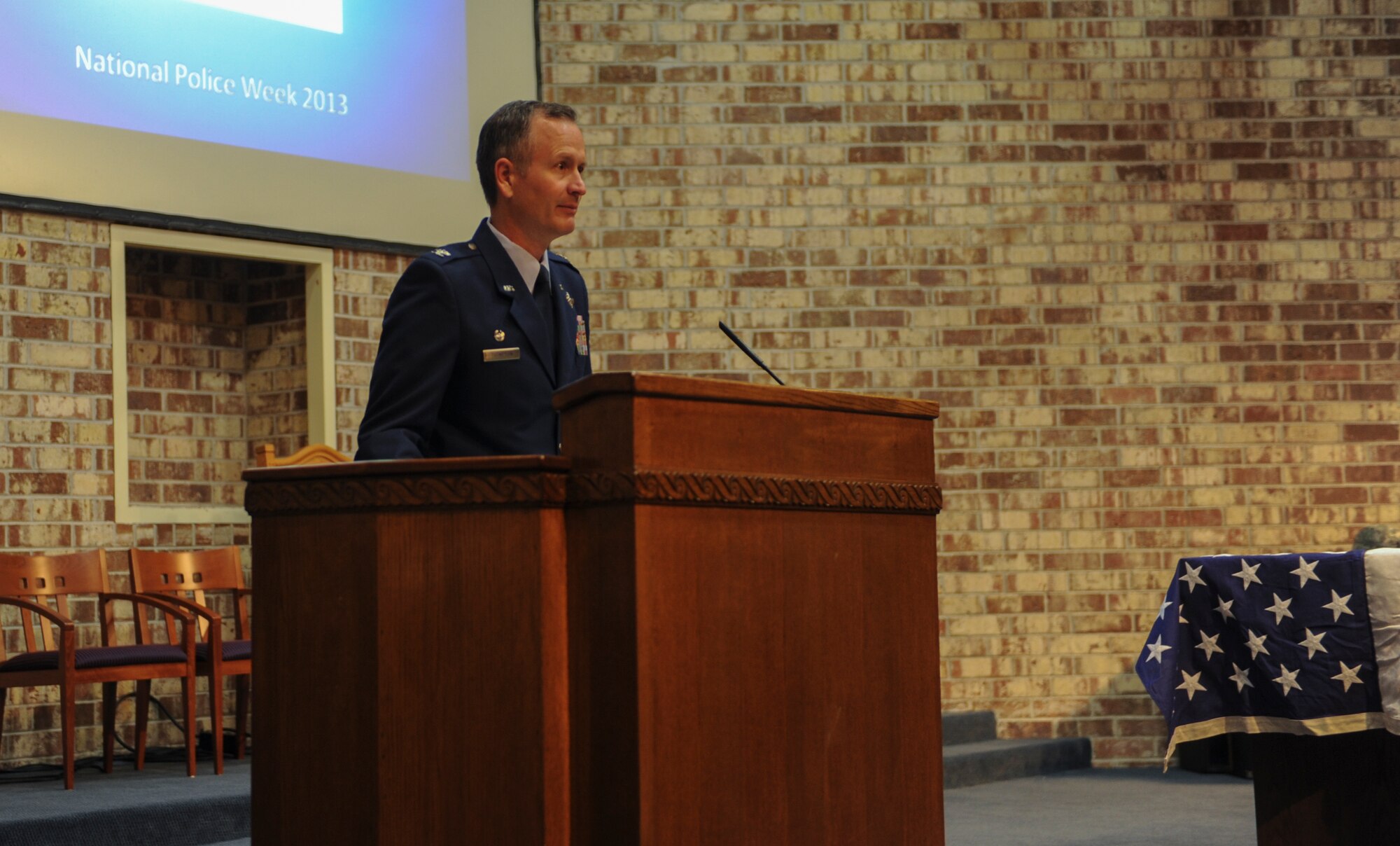 U.S. Air Force Col. Billy Thompson, 23d Wing commander, gives thanks to all of the law enforcement at Moody Air Force Base, Ga., May 15, 2013. The week of May 15 is known as National Police Week, and it is a time to reflect the police officers past and present. (U.S. Air Force photo by Airman Alexis Grotz/ Released)