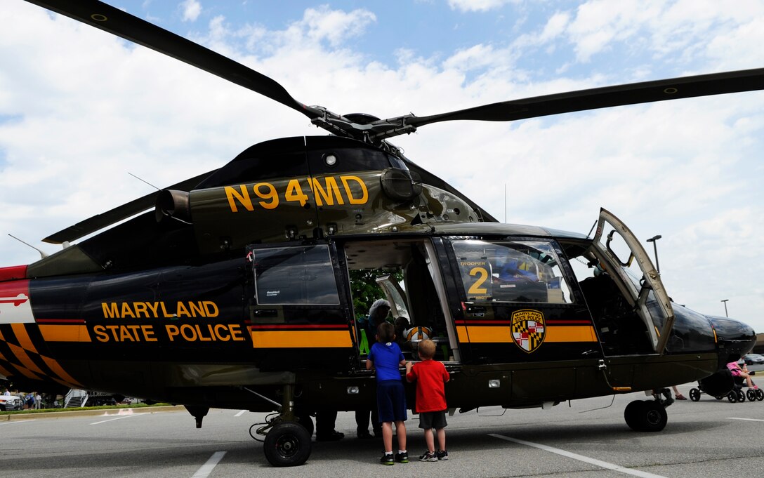 Children look inside Maryland State Police helicopter during the National Police Week Tactical First Responders Demo on May 17, 2013 at Joint Base Andrews, Md. (U.S. Air Force photo/ Airman 1st Class Nesha Humes)