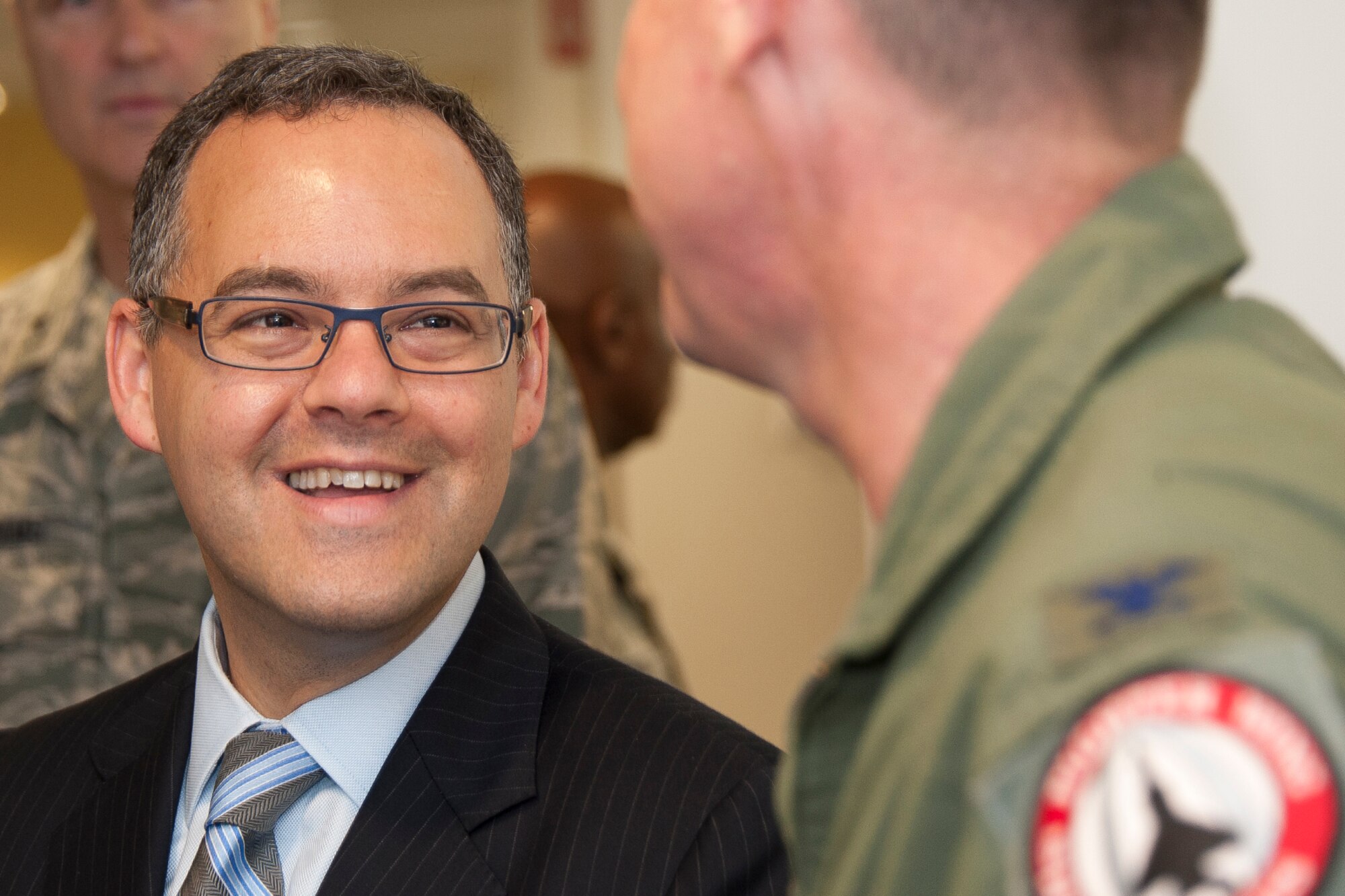 The Honorable Daniel B. Ginsberg, assistant secretary of the Air Force for Manpower and Reserve Affairs, greets Airmen at the Air National Guard Readiness Center, Joint Base Andrews, Md. During his visit Ginsberg met with personnel from various ANG directorates and learned about what Airmen and civilians at the ANGRC do every day to support the field. The ANGRC ensures ANG field units are properly resourced to train and equip in support of the state and federal missions across the entire spectrum of military operations and provide support sustaining ANG Airmen throughout their careers. (Air National Guard photo by Master Sgt. Marvin Preston/RELEASED)