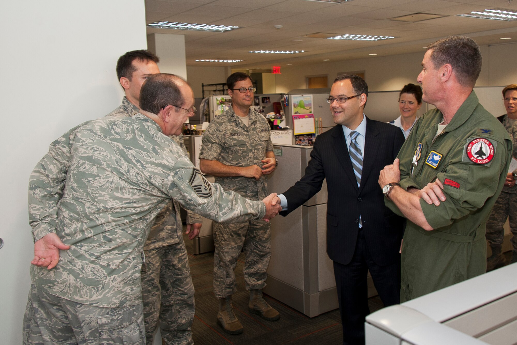 The Honorable Daniel B. Ginsberg, assistant secretary of the Air Force for Manpower and Reserve Affairs, greets Airmen at the Air National Guard Readiness Center, Joint Base Andrews, Md. During his visit Ginsberg met with personnel from various ANG directorates and learned about what Airmen and civilians at the ANGRC do every day to support the field. The ANGRC ensures ANG field units are properly resourced to train and equip in support of the state and federal missions across the entire spectrum of military operations and provide support sustaining ANG Airmen throughout their careers. (Air National Guard photo by Master Sgt. Marvin Preston/RELEASED)