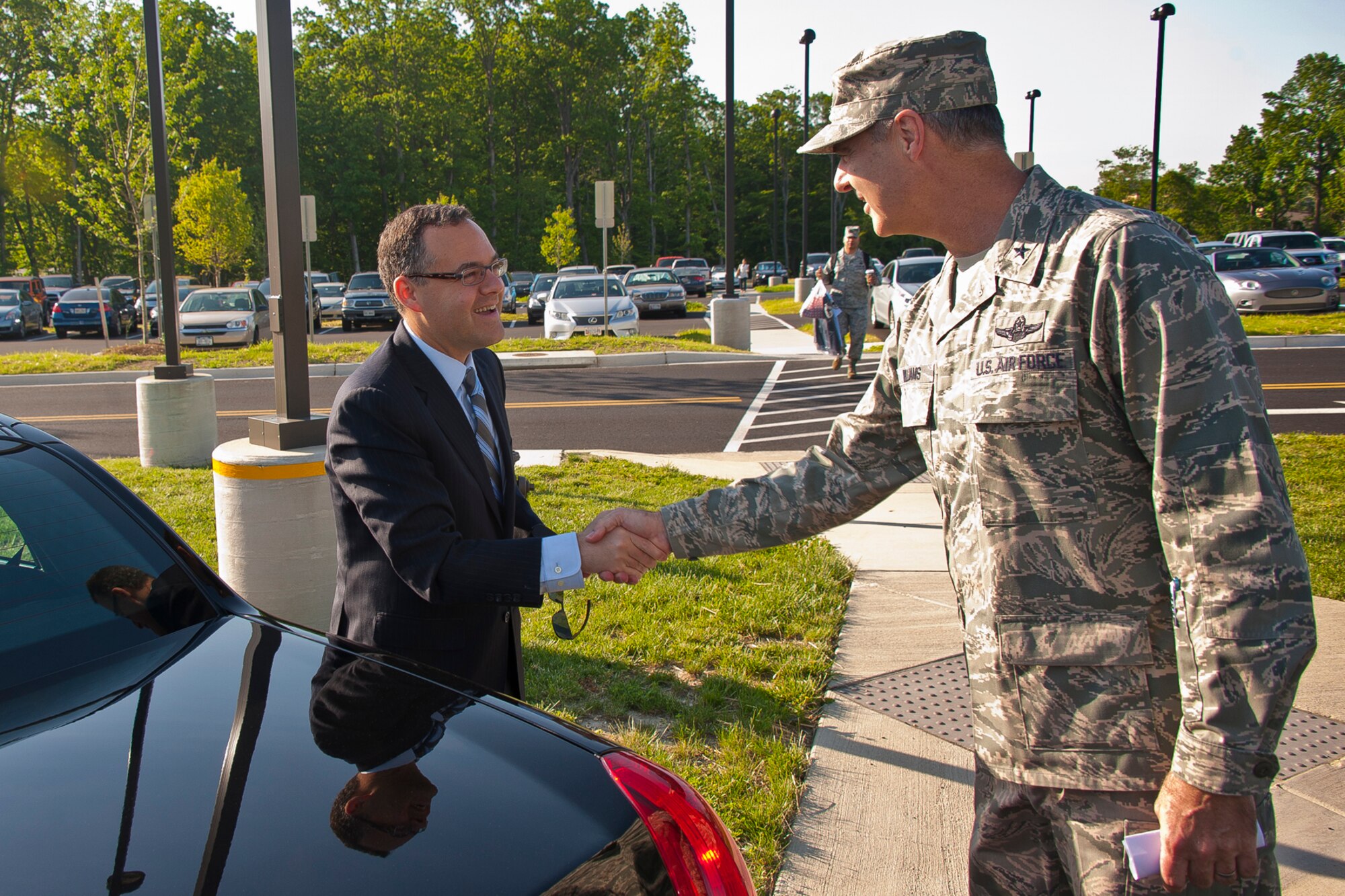 The Honorable Daniel B. Ginsberg, assistant secretary of the Air Force for Manpower and Reserve Affairs, is greeted by Brig. Gen. R. Scott Williams, commander of the Air National Guard Readiness Center, Joint Base Andrews, Md. During his visit Ginsberg met with personnel from various ANG directorates and learned about what Airmen and civilians at the ANGRC do every day to support the field. The ANGRC ensures ANG field units are properly resourced to train and equip in support of the state and federal missions across the entire spectrum of military operations and provide support sustaining ANG Airmen throughout their careers. (Air National Guard photo by Master Sgt. Marvin Preston/RELEASED)