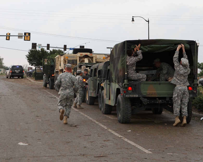 Oklahoma National Guard soldiers and airmen respond to a devastating tornado that ripped through Moore, Okla., May 20, 2013. (Photo by Sgt. 1st Class Kendall James)