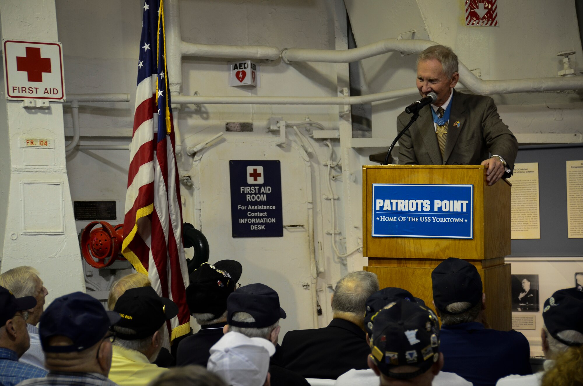 Retired U.S. Marine Corps Maj. Gen. Jim Livingston talks about the crewmembers of USS Franklin (CV 13) during a memorial service May 17, 2013, aboard the USS Yorktown (CV 10) at Patriots Point Naval and Maritime Museum, Mount Pleasant, S.C. In honor of the historic reunion, Patriots Point hosted a series of events and educational programs throughout the day to allow the public an opportunity to speak with and hear from the veterans. (U.S. Air Force photo/Staff Sgt. Anthony Hyatt)