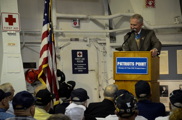 Retired U.S. Marine Corps Maj. Gen. Jim Livingston talks about the crewmembers of USS Franklin (CV 13) during a memorial service May 17, 2013, aboard the USS Yorktown (CV 10) at Patriots Point Naval and Maritime Museum, Mount Pleasant, S.C. In honor of the historic reunion, Patriots Point hosted a series of events and educational programs throughout the day to allow the public an opportunity to speak with and hear from the veterans. (U.S. Air Force photo/Staff Sgt. Anthony Hyatt)