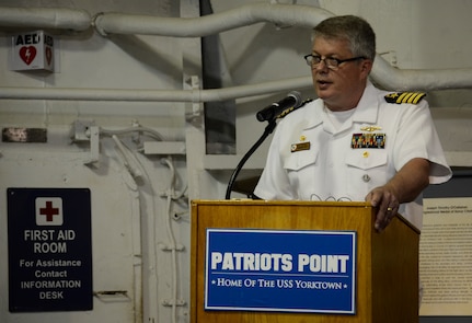 Navy Capt. Thomas Bailey, Joint Base Charleston deputy commander, speaks about the USS Franklin (CV 13) mission during a memorial service May 17, 2013, aboard the USS Yorktown (CV 10) at Patriots Point Naval and Maritime Museum, Mount Pleasant, S.C. In honor of the historic reunion, Patriots Point hosted a series of events and educational programs throughout the day to allow the public an opportunity to speak with and hear from the veterans. (U.S. Air Force photo/Staff Sgt. Anthony Hyatt)