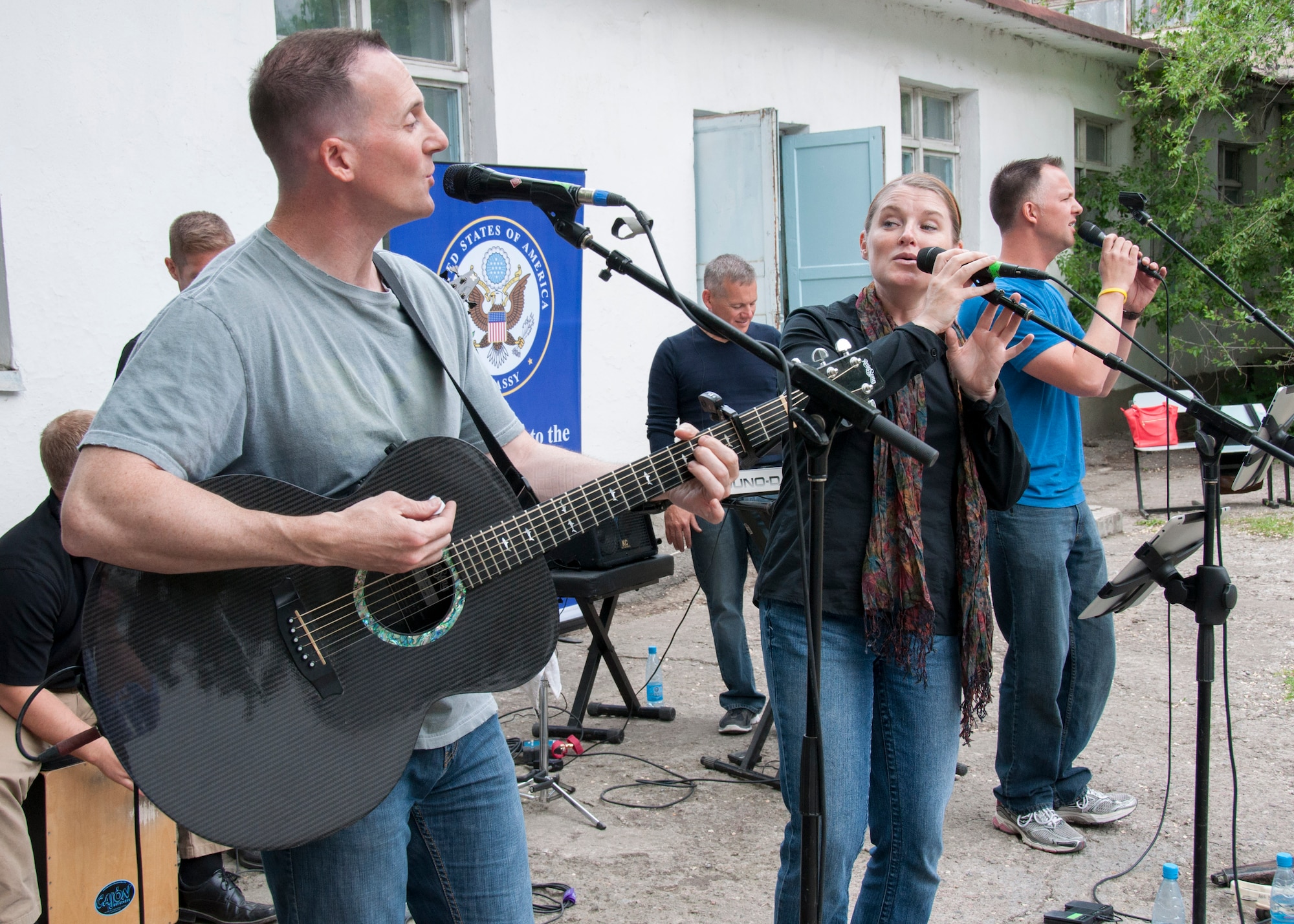 Members of the U.S. Air Forces Central Command band, Vector, perform at a secondary school May 3, 2013, in Kant, Kyrgyzstan. The group performed a variety of rock songs for the students. (U.S. Air Force photo/Tech. Sgt. Rachel Martinez)