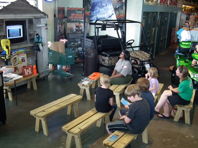 Bass Pro Shop customers take time to learn about water saftety. 