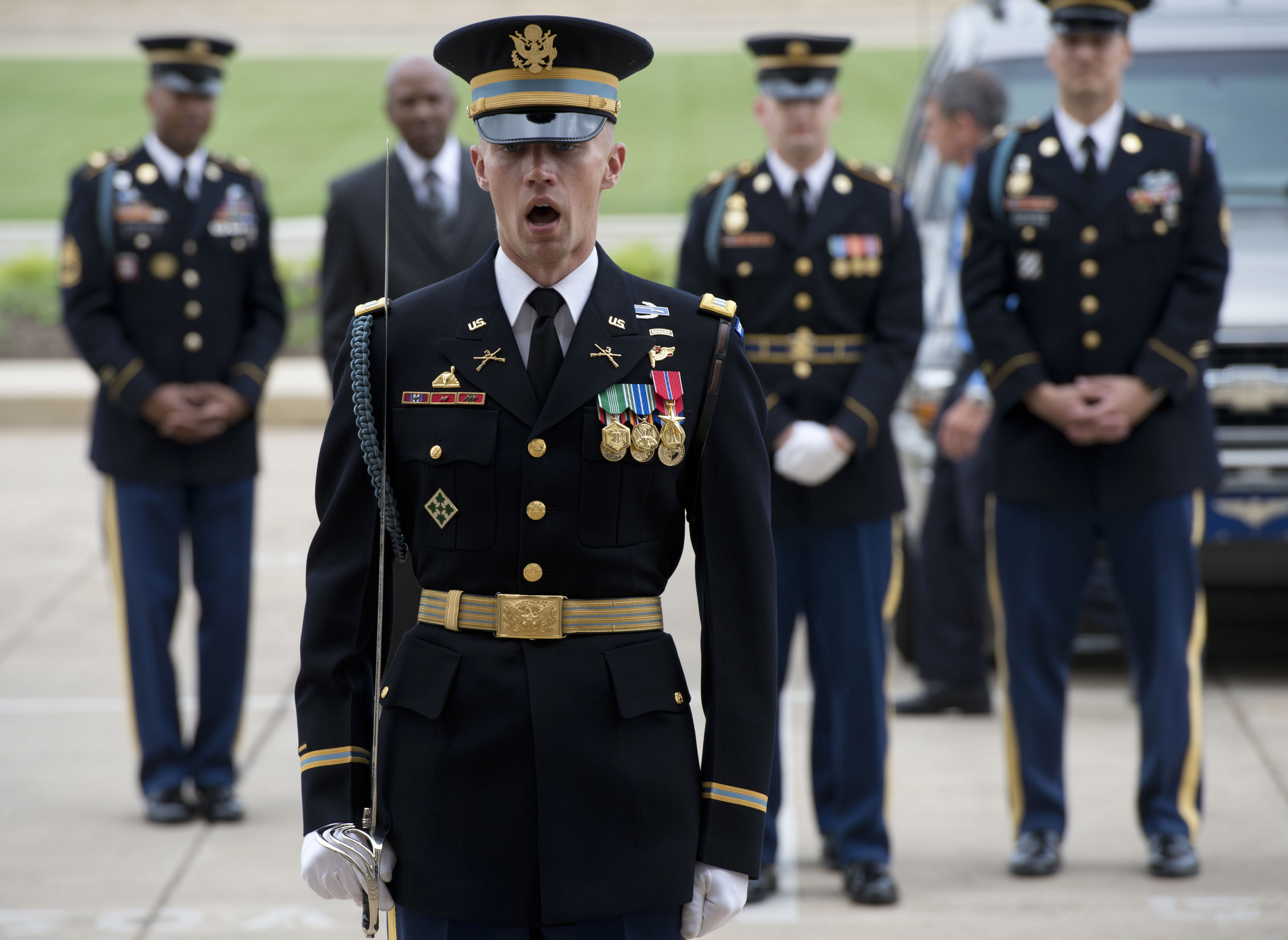 A U S Army Captain Positions A Military Honor Guard To Welcome 