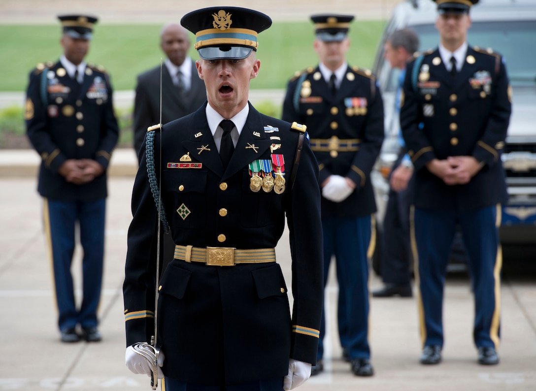 A U.S. Army captain positions a military honor guard to welcome Australian Defense Minister Stephen Smith to the Pentagon, May 21, 2013.