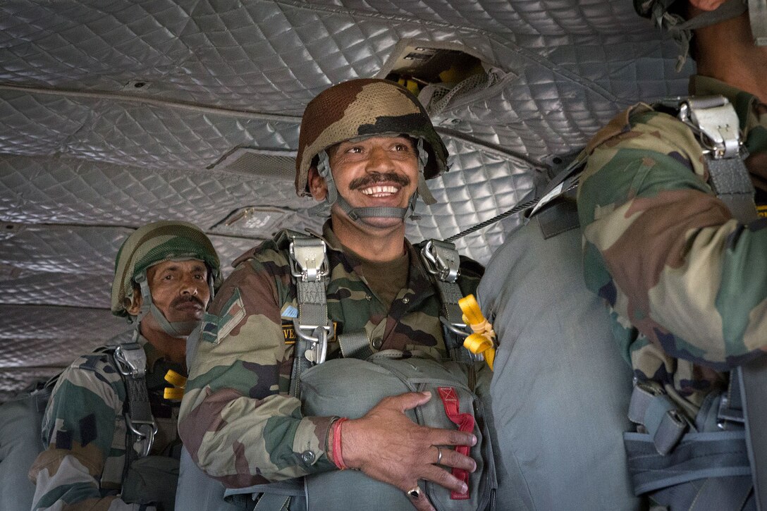 An Indian paratrooper smiles before jumping from a CH-47 Chinook helicopter during the Yudh Abhyas bilateral training exercise on Fort Bragg, N.C., May 15, 2013.