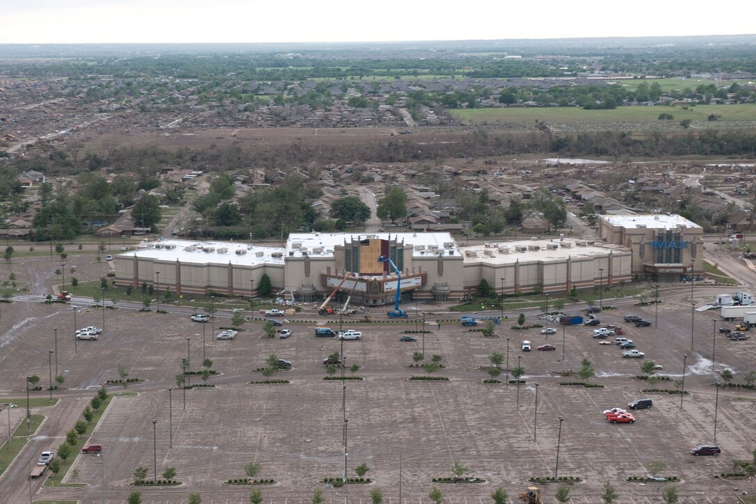 Oklahoma National Guard members fly over tornado damage in Moore, Okla., May 21, 2013.