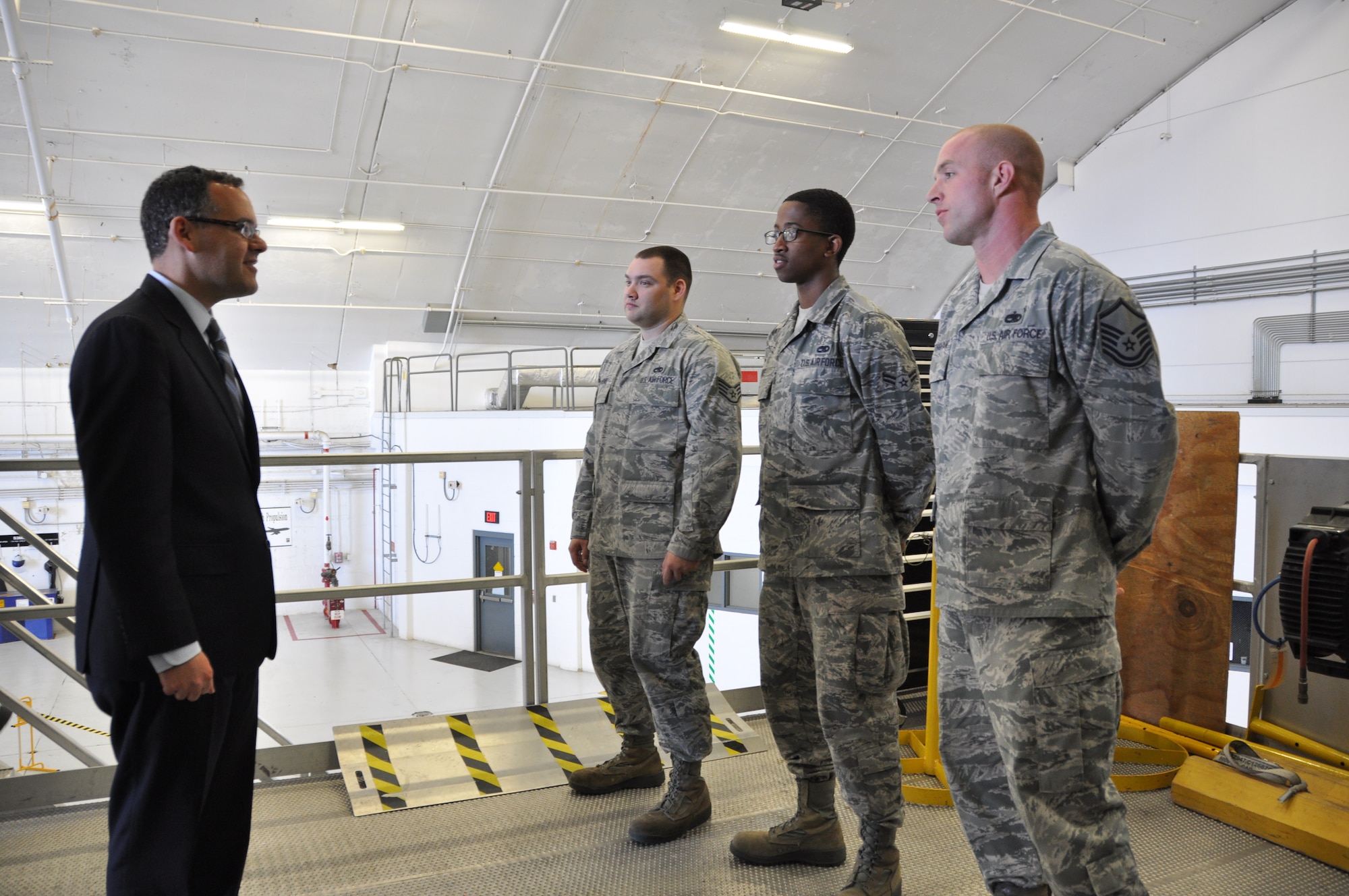 Mr. Daniel Ginsberg, Assistant Secretary of the Air Force for Manpower and Reserve Affairs, Washington, D.C., chats with Airmen from the 459th Aircraft Maintenance Squadron during a visit to the 459th Air Refueling Wing at Joint Base Andrews, Md., May 17, 2013. Ginsberg visited the wing to interact with the Airmen and answer questions regarding manpower issues. (U.S. Air Force photo/ Staff Sgt. Katie Spencer)