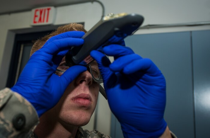 Airman 1st Class Chaz Wise, 628th Logistics Readiness Squadron Fuels technician, uses a device to test the level of Fuels System Icing Inhibitor in Jet fuel May 9, 2013, at Joint Base Charleston – Air Base, S.C. Fuels System Icing Inhibitor prevents water in the fuel from freezing and prevents organisms from growing in the water as well. (U.S. Air Force photo/ Senior Airman Dennis Sloan)