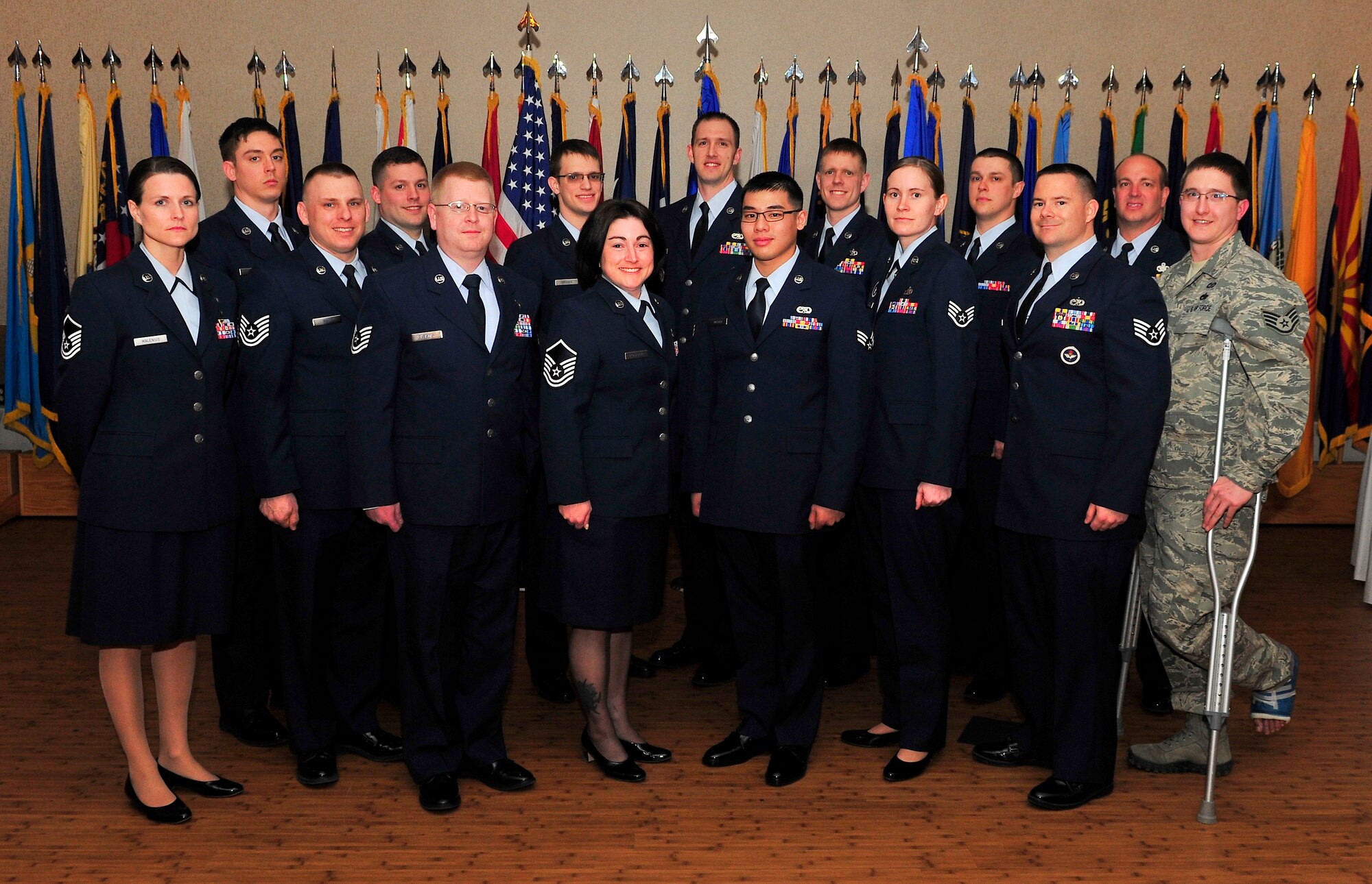 Graduates from the Community College of the Air Force are recognized during a ceremony May 20, 2013, Eielson Air Force Base, Alaska. Since issuing its first degree in 1977, the college has awarded more than 335,000 associate in applied science degrees. (U.S. Air Force photo by Racheal E. Watson/Released)