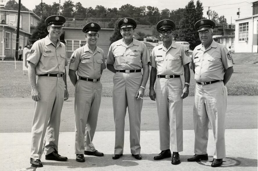 MCGHEE TYSON AIR NATIONAL GUARD BASE, Tenn. – The first instructors of the Air National Guard Noncommissioned Officers Academy in 1968 get their photo taken with U.S. Air Force Maj. Gen. I.G. Brown, then Director of the Air National Guard. From left, U.S. Air Force Tech. Sgt. Sheridan J. Lloyd, Senior Master Sgt. Robert Alexander, Maj. Gen. I.G. Brown, Senior Master Sgt. Joseph Diaz and Senior Master Sgt. Donald Pettirew at their ranks shown. NCO Academy was the I.G. Brown Training and Education Center’s first program of instruction. The TEC was later dedicated to Brown during its 10th anniversary celebration, June 1978. (U.S. Air National Guard file-photo/Released)
