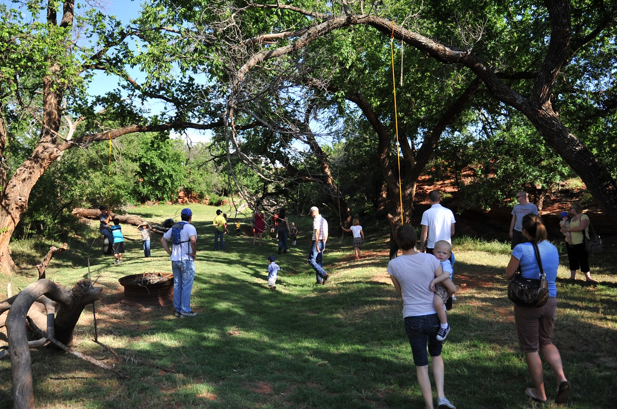 NINE-MILE SPRING, Okla. – Altus Air Force Base family members gather together at a farm near Nine-Mile Spring as part of the Altus Committee of 100 dinner, May 20. The event is held quarterly to bring the base and community members together to welcome newcomers and Airmen returning from deployment. (U.S. Air Force photo by Senior Airman Dillon Davis/Released)
