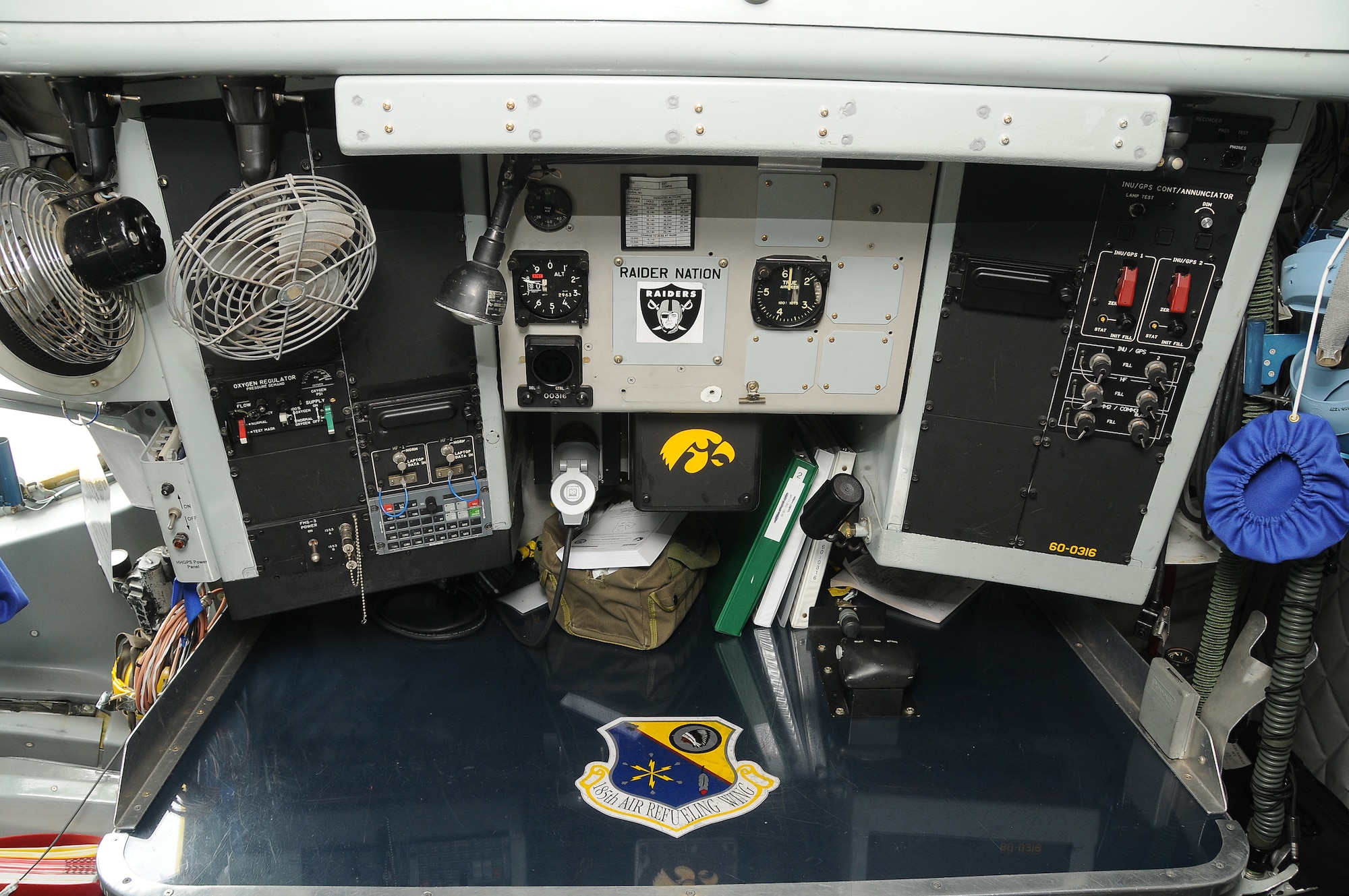 The Navigation (Nav) table inside this KC-135 is adorned with an array of personalized stickers including the aircrafts moniker “Raider Nation” of the National Football league’s Oakland Raiders and “Herky” the Hawk, the emblem of the University of Iowa’s Hawkeye athletic program. 
U.S. Air Guard Photo by: Master Sgt. Vincent De Groot /released