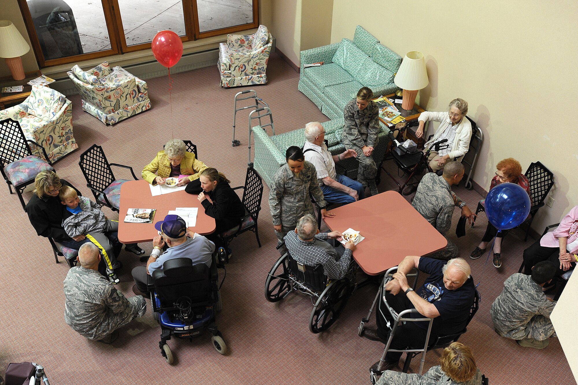 MINOT, N.D. -- Members of the 791st Missile Security Forces Squadron’s Friends of Veterans organization hosted an ice cream social at Trinity Homes in Minot, May 18. They treated all residents of the facility, including their family members and staff, to ice cream. The event was part of the organization’s community outreach initiative to support local veterans and others in the area. This was the first ever social for the Friends of Veterans organization, and  they hope to host events like these in the near future. More than 40 Airmen volunteered to take part in the event. (U.S. Air Force photo/Senior Airman Jose L. Hernandez)