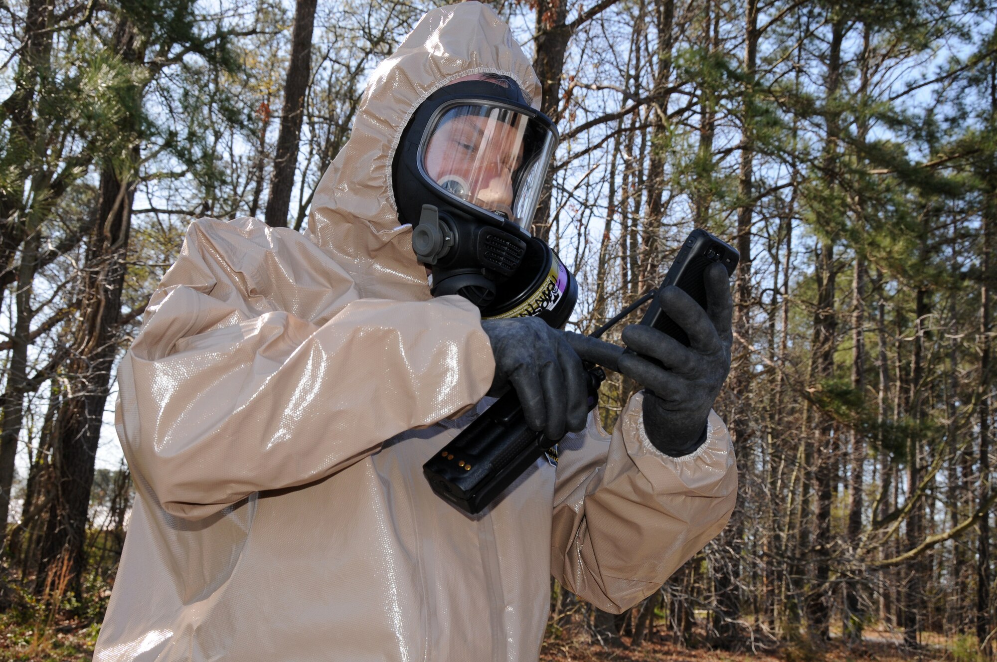Master Sgt. Thomas Powell, 192nd Medical Group Bio-environmental specialist, monitors air quality during an exercise at Langley Air Force Base, April 7.  192nd MDG is one of four elements that is part of the Virginia National Guard’s special response force for Chemical Biological Radiological Nuclear High Yield Explosive Response Force Package, known as the CERFP (pronounced “surf-p”).  The CERFP can conduct tasks associated with incident management, urban search and rescue, mass causality decontamination, technical decontamination, medical triage and treatment and fatality search and recovery.  (U.S. Air National Guard photo by Master Sgt. Carlos J. Claudio/Released)