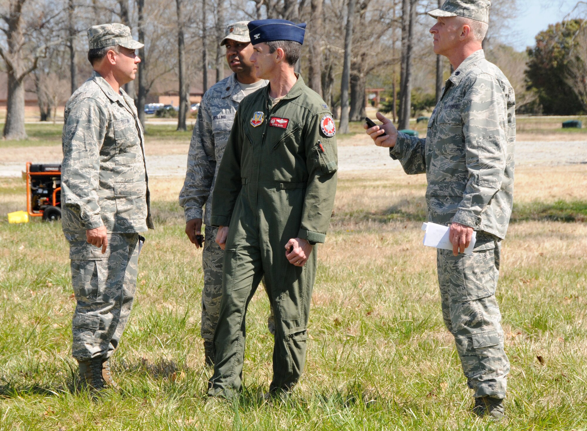 Col. Keith Wark (center), 192nd Fighter Wing Commander, observes personnel and equipment footprint with 192nd medical group leadership at Langley Air Force Base, April 7.  192nd MDG is one of four elements that is part of the Virginia National Guard’s special response force for Chemical Biological Radiological Nuclear High Yield Explosive Response Force Package, known as the CERFP (pronounced “surf-p”).  The CERFP can conduct tasks associated with incident management, urban search and rescue, mass causality decontamination, technical decontamination, medical triage and treatment and fatality search and recovery.  (U.S. Air National Guard photo by Airman First Class Johnisa B. Roberts/Released)