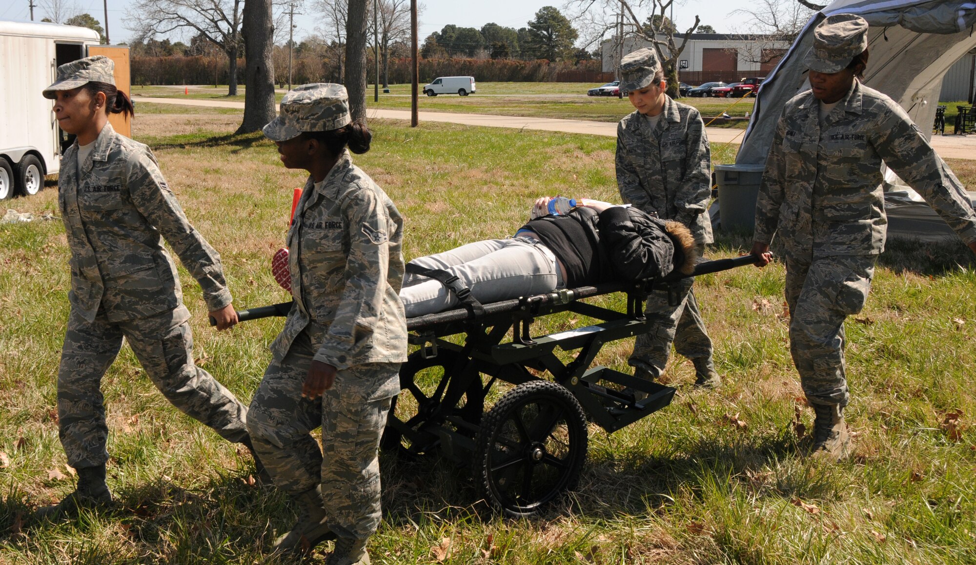 Members of the 192nd Fighter Wing Medical Group conducted a readiness exercise to respond to simulated disasters and other emergencies at Langley Air Force Base, April 7.  The medical group uses the triage method to assess victims of disasters and direct them to the appropriate area for treatment.  (U.S. Air National Guard photo by Airman First Class Johnisa B. Roberts/Released) 