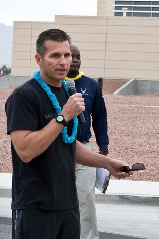 Col. Barry Cornish, 99th Air Base Wing commander, speaks before the Resiliency Day 5 kilometer race May 17, 2013, at Nellis Air Force Base, Nev. Cornish emphasized safety and resiliency to participants. (U.S. Air Force photo by Senior Airman Matthew Lancaster)