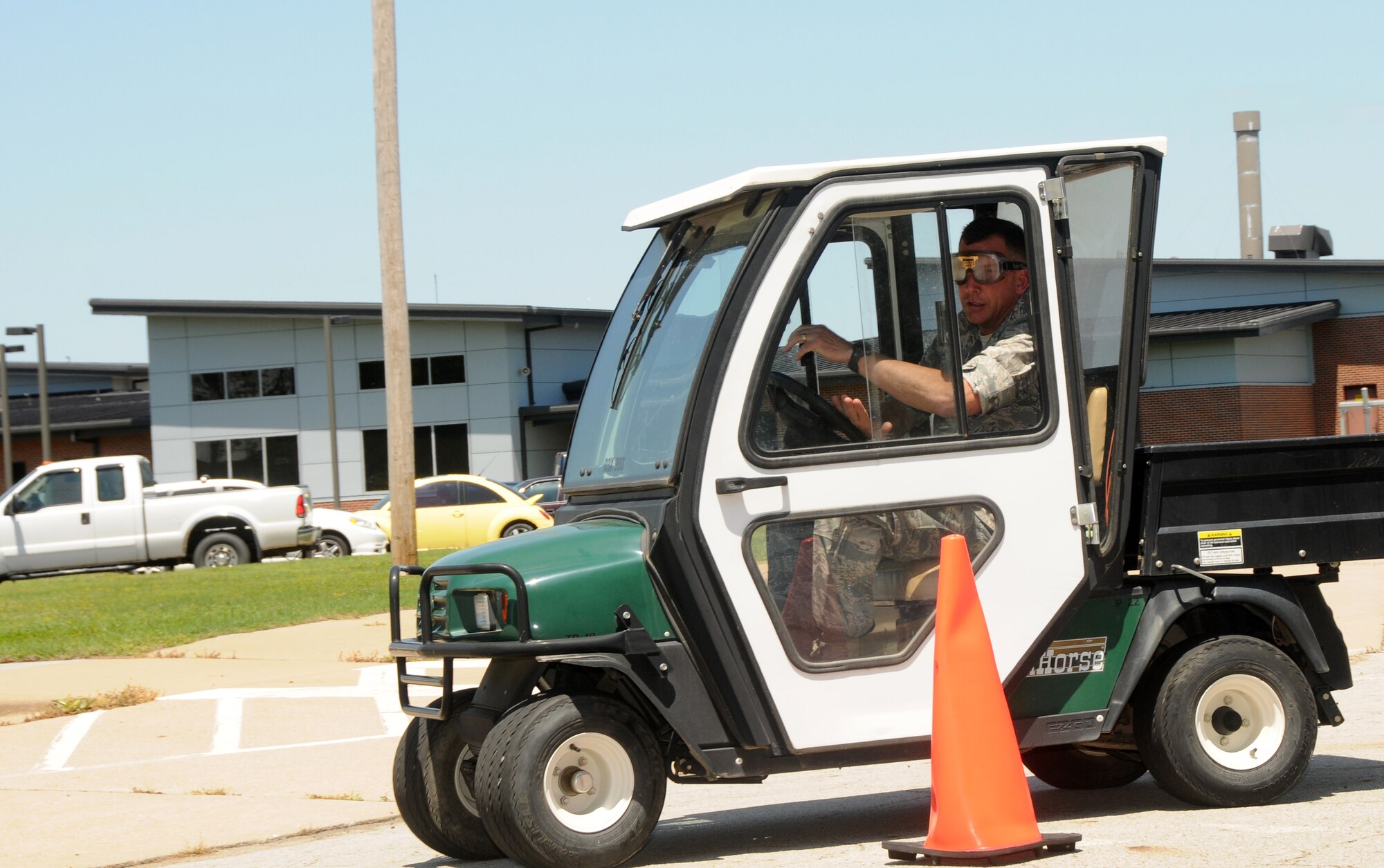 Col. Peter Gauger, 188th Fighter Wing vice commander, negotiates the drunk driving simulator course during the wing's Alcohol Abuse Awareness Day, May 12, 2013. More than 90 Airmen took part in the event, which featured the simulator, guest speakers and a video presentation. (U. S. Air National Guard photo by Senior Airman John Hillier/188thFighter Wing Public Affairs)