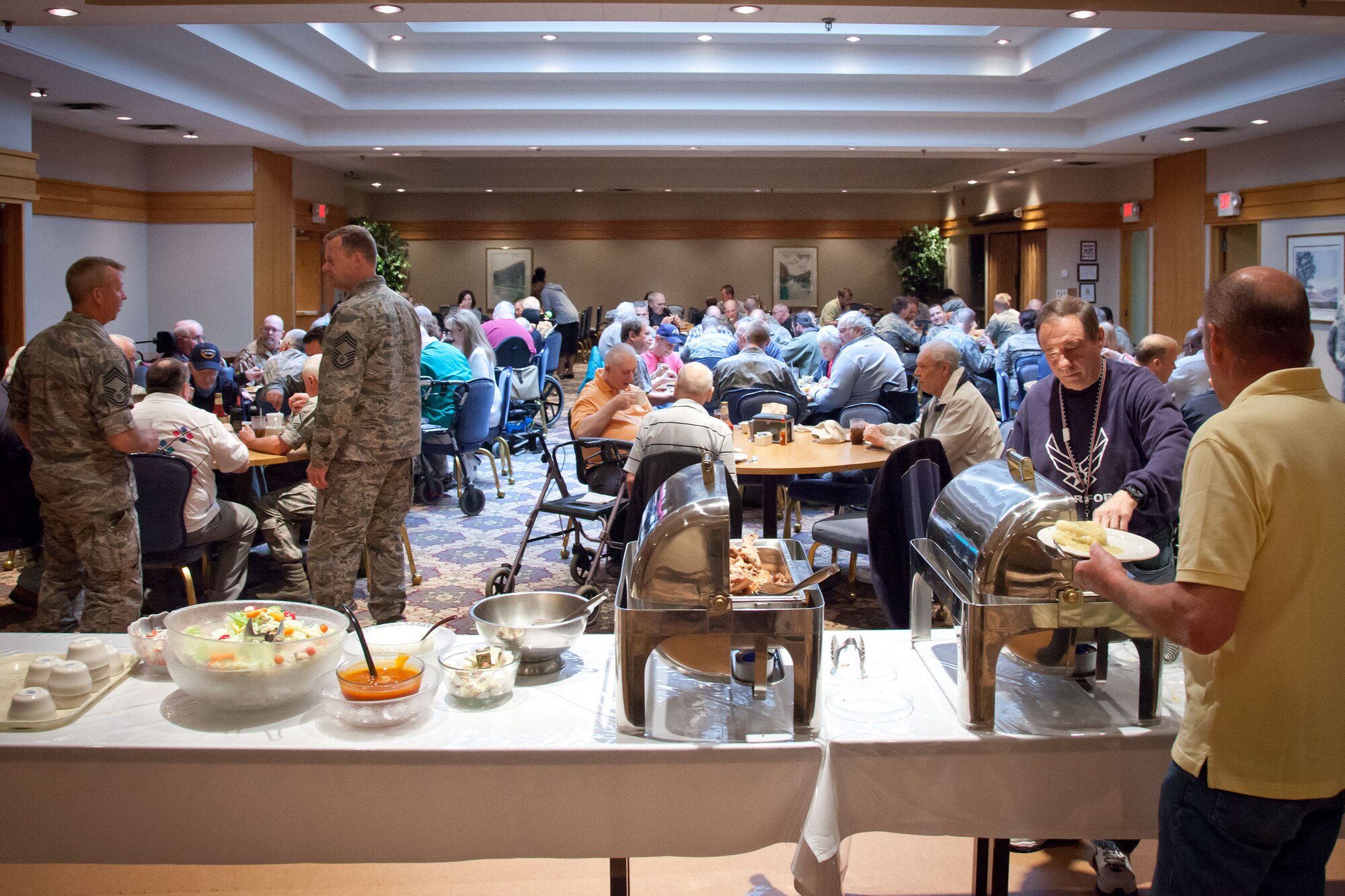 The 934th Airlift Wing hosts its annual Take a Vet to Lunch day at the Services Club at the Minneapolis-St. Paul Air Reserve Station.  Residents of the Minneapolis and Hastings Veterans Homes had lunch with service members and took a tour of a C-130.  (U.S. Air Force photo/Shannon McKay)