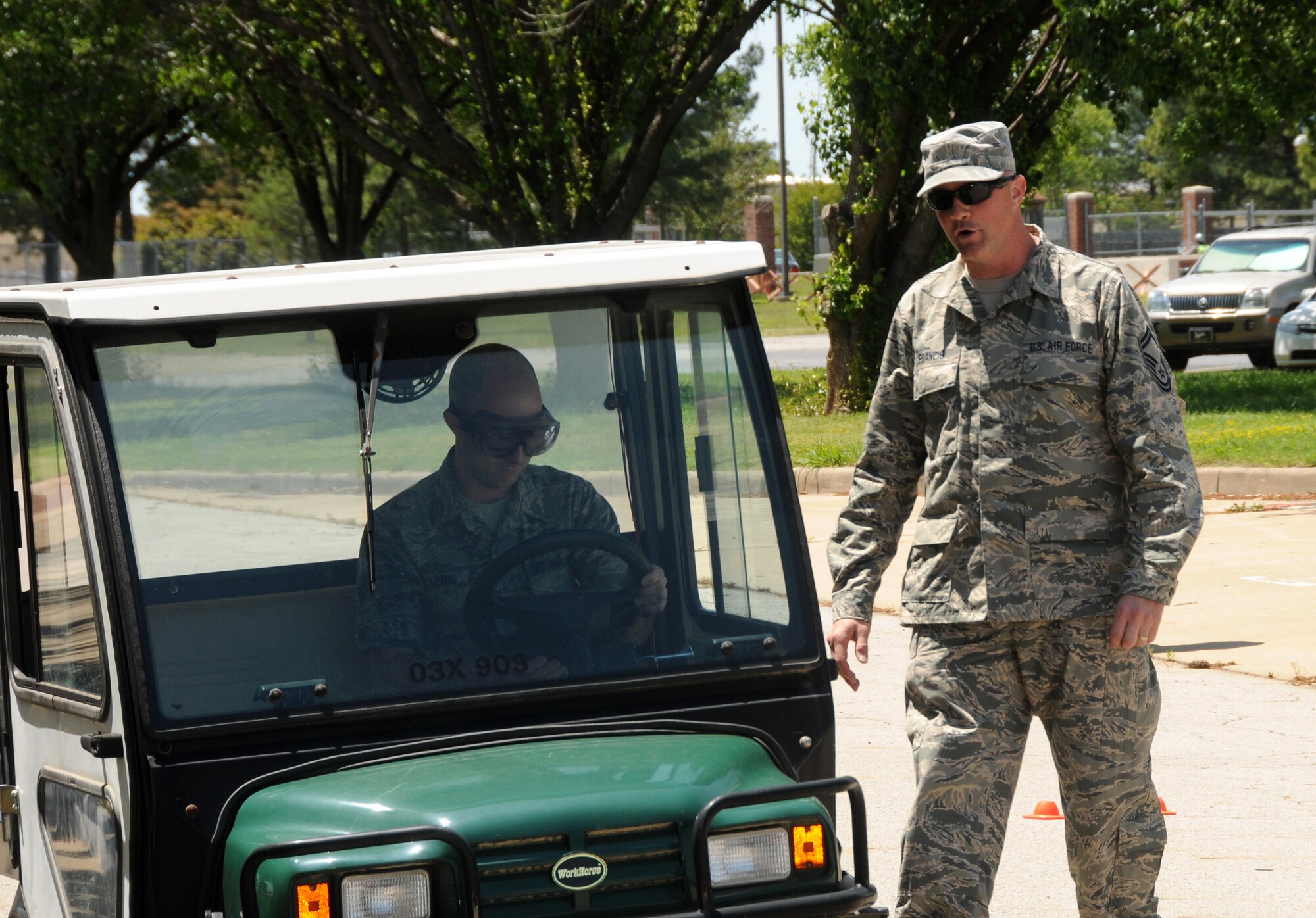 Airman 1st Class Spenser Lewis, an accounting technician with 188th Comptroller Flight, negotiates the drunk driving simulator course during the wing's Alcohol Abuse Awareness Day, May 12, 2013. More than 90 Airmen took part in the event, which featured the simulator, guest speakers and a video presentation. (U.S. Air National Guard photo by Senior Airman John Hillier/188thFighter Wing Public Affairs)