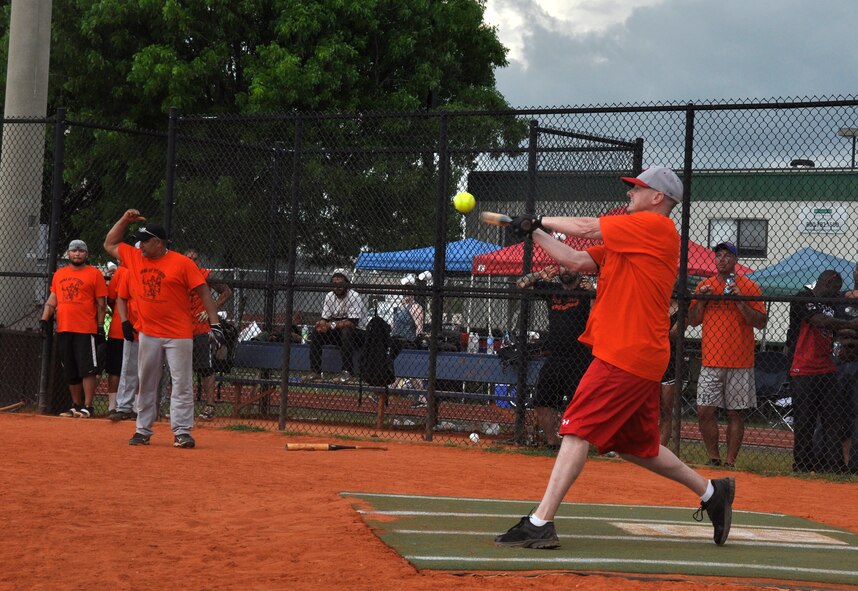 Michael Johnson of the Sons of Pitches spanks a home run during the championship game of Homestead Air Reserve Base, Fla.’s Softball Challenge tournament May 18. The championship game came down to the Sons of Pitches defeating the Fighting Mariposas with a final score of 26-9. (U.S. Air Force photo/Senior Airman Jaimi Upthegrove)