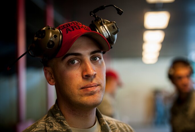 Staff Sgt. Eric Lawrence, 628th Security Forces Squadron Combat Arms Training and Maintenance instructor, was the lead CATM instructor during the Security Forces Shooting Competition May 15, 2013, at Joint Base Charleston – Air Base, S.C. Service members, civilians, dependents and retirees from the base and local community competed in teams of four against one another in honor of National Police Week. (U.S. Air Force photo/ Senior Airman Dennis Sloan)