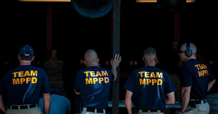 Members of the Mount Pleasant Police Department compete in the Security Forces Shooting Competition May 15, 2013, at Joint Base Charleston – Air Base, S.C. Service members, civilians, dependents and retirees from the base and local community competed in teams of four against one another in honor of National Police Week. (U.S. Air Force photo/ Senior Airman Dennis Sloan)
