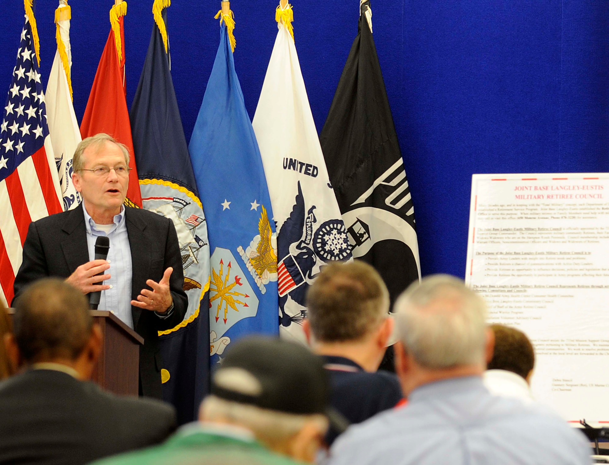 Retired U.S. Army Col. D. Keith Morrow, 733rd Mission Support Group deputy commander, addresses the crowd during the annual Retiree Appreciation Day at Fort Eustis, Va., May 18, 2013. The event featured Morrow as the guest speaker and also had informational booths, an outdoor recreational vehicle display and bingo. (U.S. Air Force photo by Staff Sgt. Dana Hill/Released)