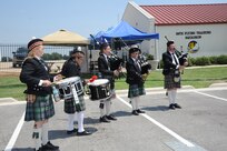 Bagpipes play Amazing Grace at the dedication of  Jahns Hall building 39 at Joint Base San Antonio-Randolph, May 17, 2013. Maj. Peter "Oly" Jahns, a former T-38 instructor pilot, died in a crash March 19, 2003, during a routine training flight at Randolph. (Air Force photo by Richard McFadden)